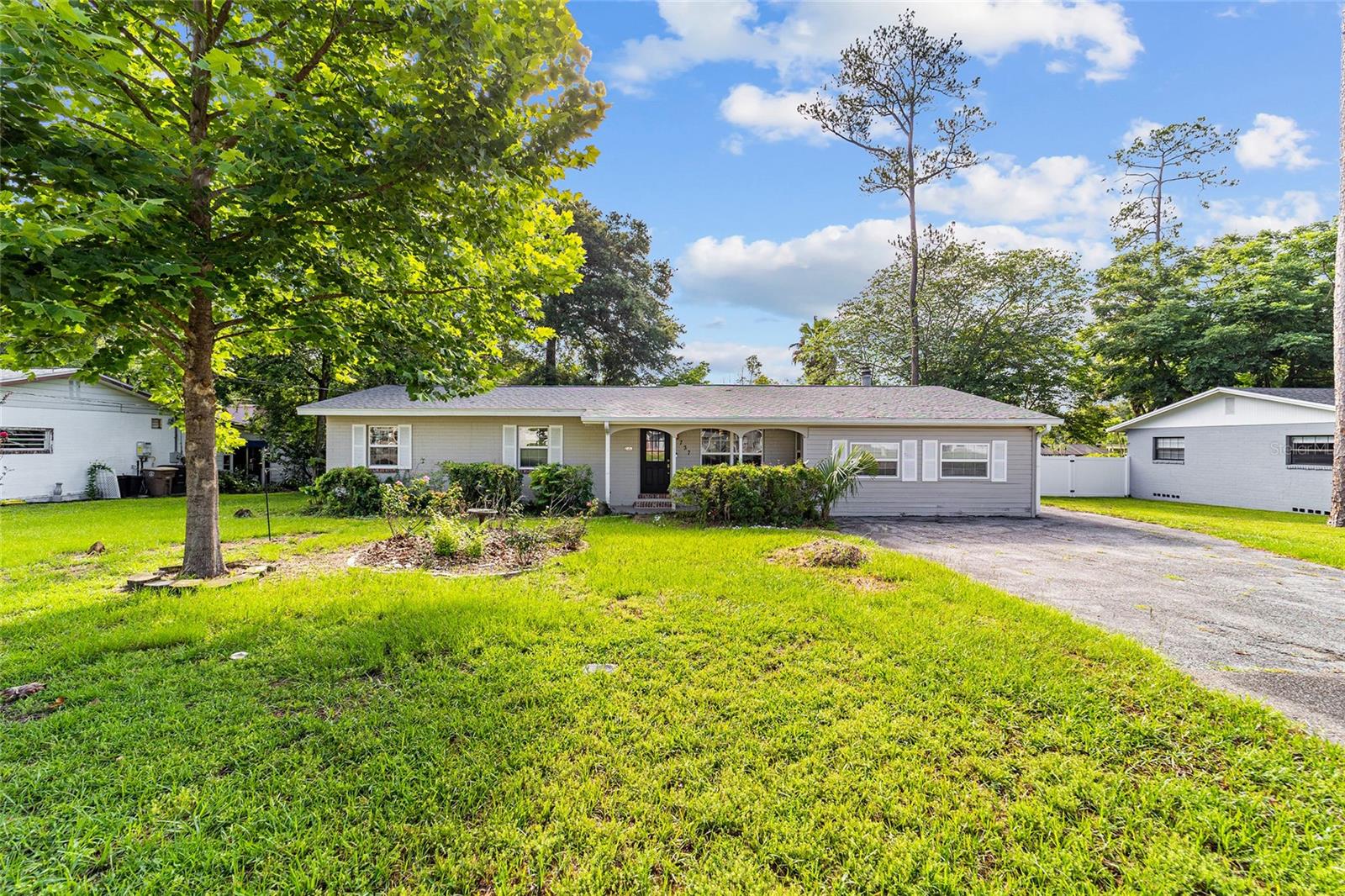 This inviting 4-bedroom, 2-bath home is nestled in the centrally located neighborhood of Heritage Hills. Enjoy comfortable living spaces and a large back yard ideal for entertaining, gardening, or spending time with family. The new roof provides peace of mind and protection from the Florida storm season. This is a great property with so much potential!