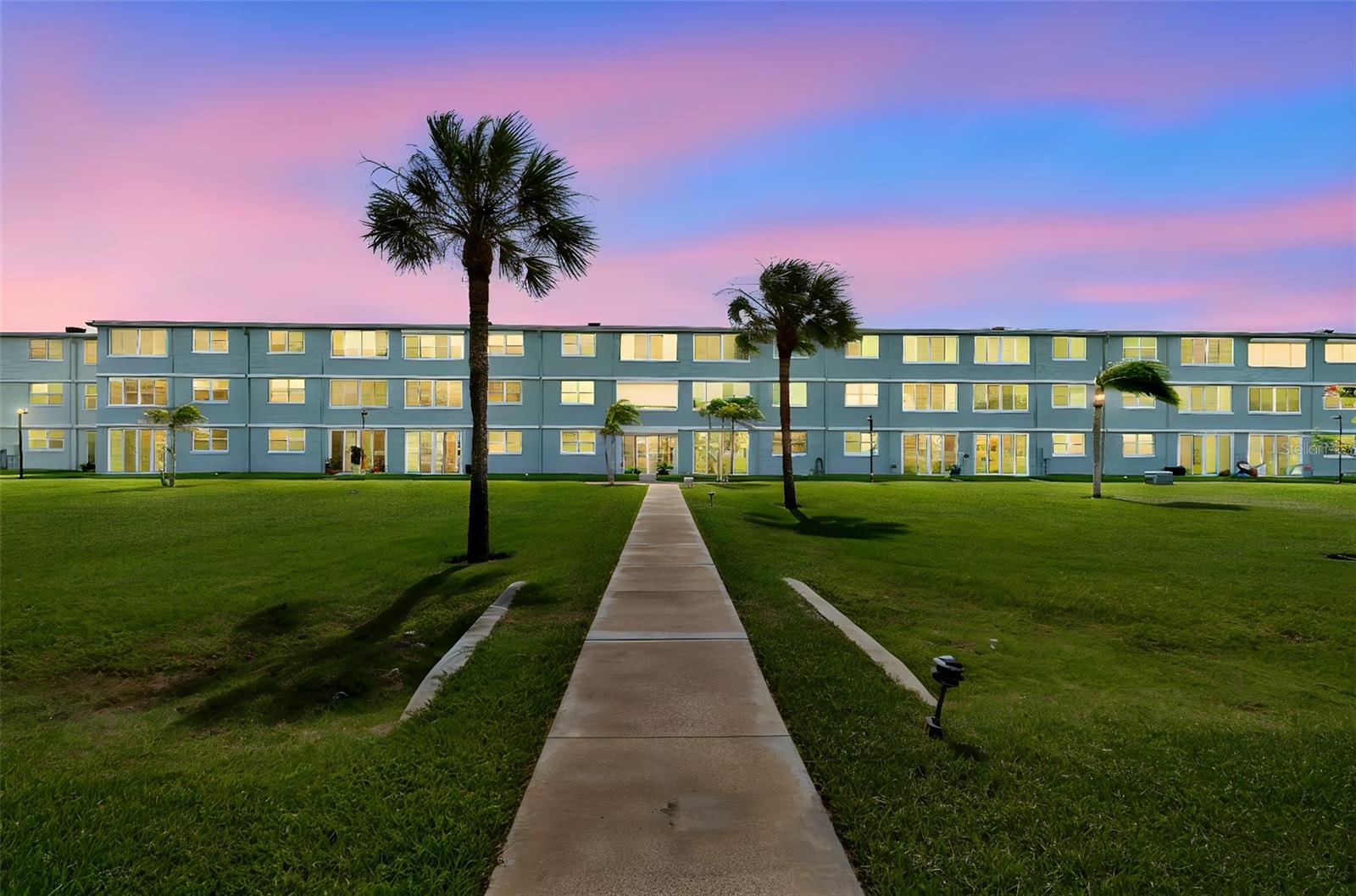Welcome to Winston Park, one of St. Petersburg's desirable 55+ communities, where comfort, convenience, and an exceptional location come together. This beautifully maintained second-floor, 2-bedroom, 2-bath condominium offers a bright, open floor plan filled with natural light and overlooks the sparkling community pool. According to the seller, the unit was not affected by Hurricanes Helene or Milton, offering added peace of mind.

Luxury vinyl tile flooring flows throughout the living spaces, creating a stylish, low-maintenance interior. The updated kitchen is designed for both everyday living and entertaining, featuring LG appliances, granite countertops, a decorative tile backsplash, Shaker-style cabinetry, and a convenient Lazy Susan for added storage.

The spacious primary suite is a true retreat, complete with custom floor-to-ceiling built-in cabinetry and a generous walk-in closet. Both bathrooms have been tastefully updated with tile flooring and walk-in showers. Additional updates include a new HVAC system installed in 2021.

Enjoy the ease of elevator access, a covered parking space, private storage, and a laundry room conveniently located on each floor. Community amenities include a clubhouse, shuffleboard courts, and BBQ grilling areas. The monthly HOA fee includes internet, water, sewer, and trash service, making for worry-free living.

Perfectly situated just minutes from the vibrant 4th Street corridor, you'll enjoy quick access to shopping, dining, two Publix supermarkets, the new Whole Foods, tennis courts, Mangrove Bay Golf Course, I-275, and Tampa International Airport. The scenic North Bay Trail is just outside the community, providing a direct route into downtown St. Petersburg for walking, biking, or enjoying Florida's beautiful waterfront lifestyle.

Whether you're searching for a year-round residence or the perfect seasonal retreat, this move-in-ready condo offers the ideal combination of comfort, convenience, and location.