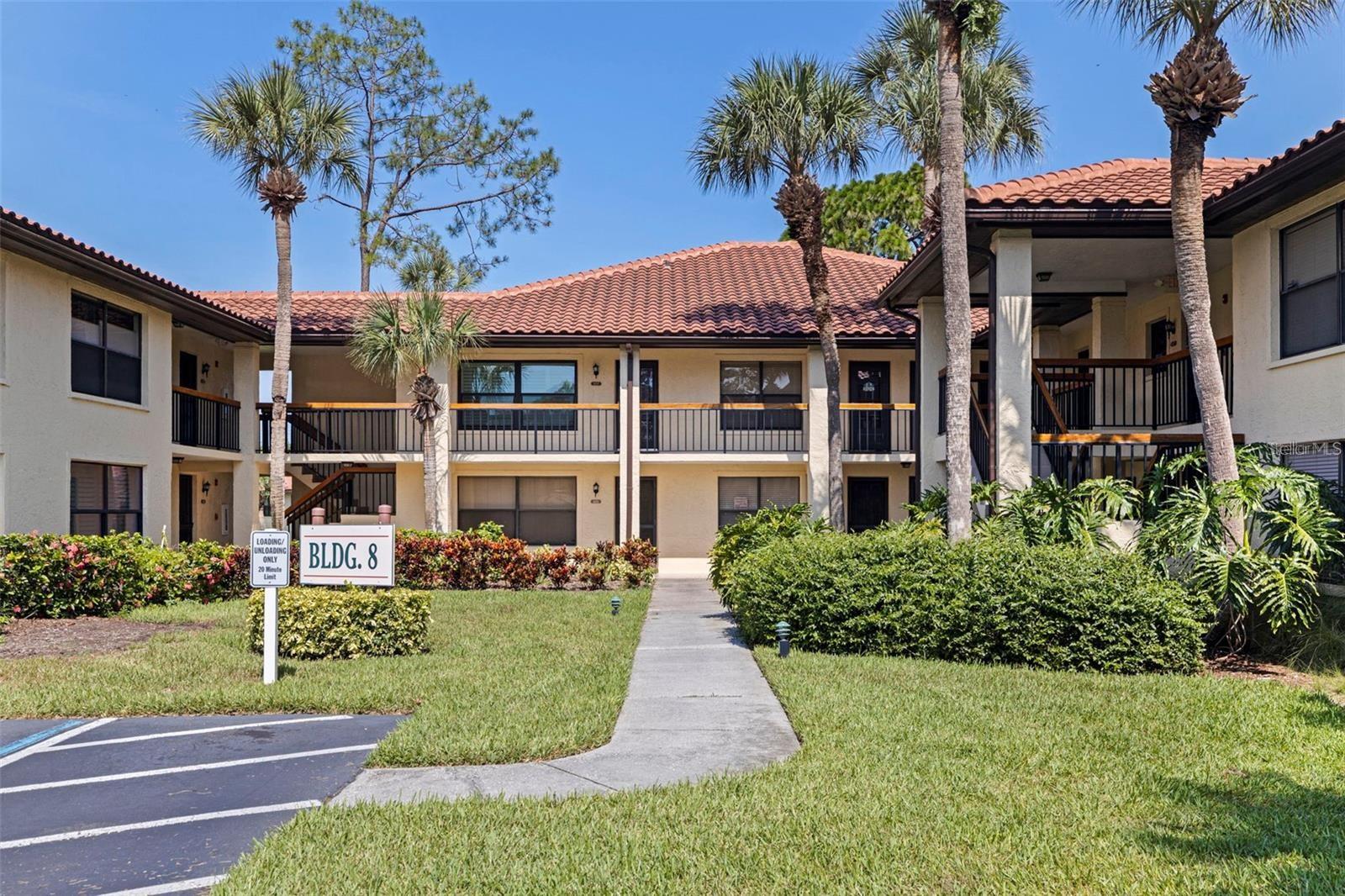 Updated Corner Condo in a Serene Gated Community! All NEW Whirlpool appliances. Welcome to a beautifully renovated second-floor corner unit tucked within the tranquil, tree-lined gates of Hammock Pine Village. This spacious 2-bedroom, 2-bath condo combines modern updates with timeless Florida charm. Step inside to discover a bright and airy open layout, featuring a full renovation and electrical updates  for peace of mind. The corner-unit placement offers extra privacy, abundant natural light, and views of the lush landscaping and serene lakeview from every window. The kitchen and bathrooms have been thoughtfully updated with stylish finishes, and the private screened-in balcony is the perfect spot for morning coffee or sunset relaxation. Hammock Pine Village offers resort-style amenities, including a sparkling pool and spa, tennis courts, and well-maintained grounds with walking paths shaded by mature oaks. This gated community is conveniently located just minutes from US-19, making it easy to access Clearwater Beach, Downtown Dunedin, Safety Harbor, shopping at Countryside Mall, and countless dining options. Whether you're seeking a low-maintenance primary residence or a seasonal getaway, this move-in-ready gem delivers comfort, convenience, and community.