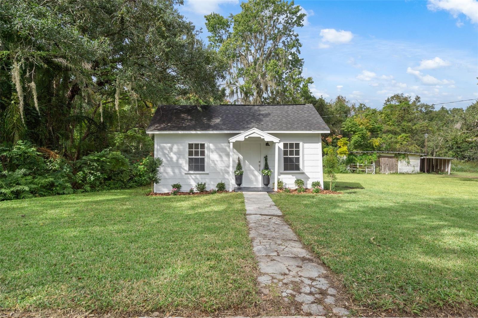 Welcome to a rare opportunity to own 2 homes in the heart of historic Brooksville! This unique 2-acre property features two separate homes —
offering endless possibilities for restoration, investment, or multi-generational living. The main home at 515 Stafford Ave is a historic 1916
residence full of character, featuring 3 bedrooms, 1 bath, a fireplace, and a carport. While it’s in need of a full renovation, the potential to bring
this timeless beauty back to life is unmatched. The second home at 505 Stafford Ave is a charming 1-bedroom, 1-bath cottage, fully updated and
has potential to be used as a vacation/airbnb rental. Updates include roof (2017), electrical upgrades (2016), and luxury vinyl tile throughout,
offering modern comfort with a cozy aesthetic. The property also includes a current survey and can be subdivided, adding flexibility for future
development or investment. Enjoy peaceful surroundings, mature trees, and a location just minutes from downtown Brooksville’s shops, dining,
and local charm.