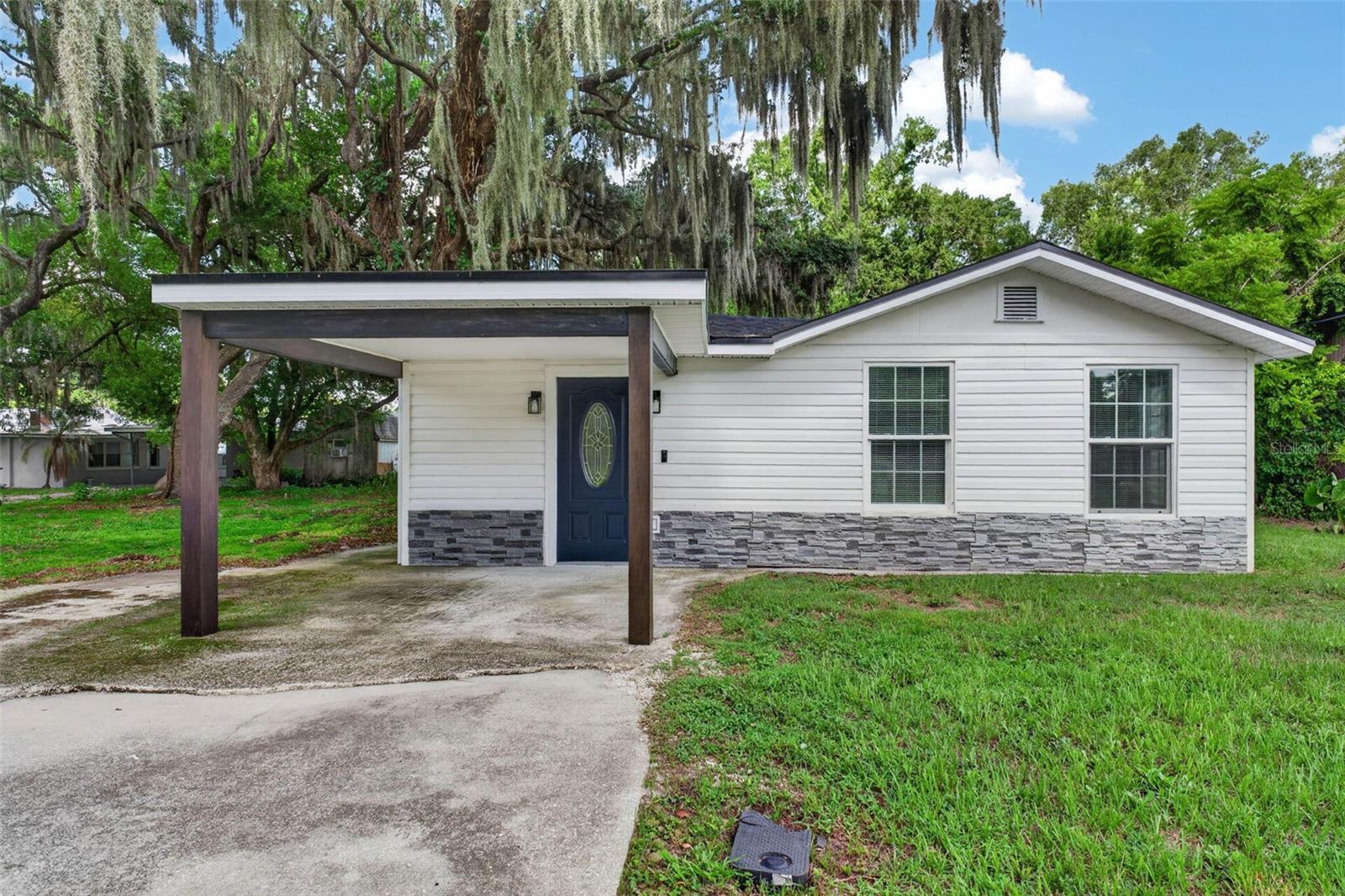 Virtually Staged. Welcome to 925 Adrian Ct in Lakeland, Florida - a beautifully updated home boasting the perfect combination of comfort, style, and peace of mind. Major improvements have already been completed, including a newer AC system, a new roof, fresh interior and exterior paint, and new flooring throughout.

The updated kitchen features modern finishes and stainless steel appliances, creating an inviting space for cooking and entertaining. The remodeled bathroom adds to the home's move-in ready appeal with updated fixtures and finishes.

Situated on a quiet street in an established neighborhood, this property has a peaceful setting while remaining conveniently located near shopping, dining, schools, and major commuter routes. The functional layout provides comfortable living spaces with flexibility for a variety of lifestyles.

Whether you're a first-time homebuyer, looking to downsize, or searching for your next investment property, 925 Adrian Ct presents an excellent opportunity to own an updated home in one of Lakeland's most convenient locations.