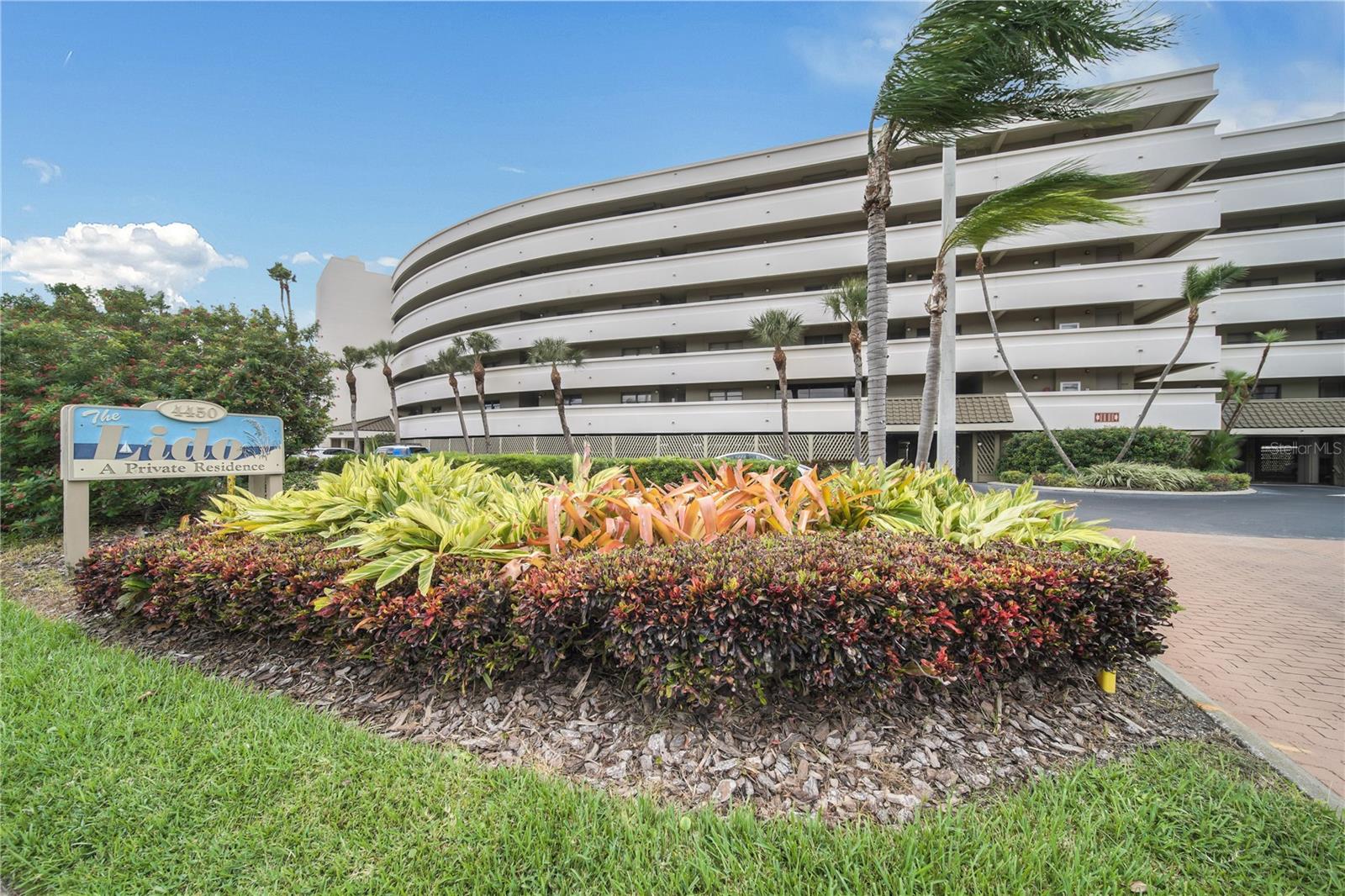 Like a magnificent amphitheater overlooking the shoreline, The Lido offers a front-row seat to the spectacular beauty of the Gulf of Mexico—where every residence is designed to capture unobstructed water views and unforgettable sunsets.  This premier second-level residence enjoys a straight-on view of the soft sands of St. Pete Beach and the sparkling waters of the Gulf. From the moment you open the door, you’re welcomed by breathtaking beach and water vistas.  The kitchen offers abundant cabinetry and prep space, stainless steel appliances, and a brand-new refrigerator (2026)—perfect for both everyday living and entertaining.  The primary suite is a true retreat, comfortably accommodating large-scale furnishings and featuring a walk-in closet and private ensuite bath with an oversized walk-in shower. The second bedroom is spacious enough to host a king-sized bed or two double beds, making it ideal for family or guests.  In addition to the two generous bedrooms, the home includes a unique 10' x 8'6" bonus space currently used as a cozy reading nook and overflow sleeping area. With minor modifications, it could easily become a home office, breakfast room, or even a third bedroom.  Additional highlights include a full-size in-unit washer and dryer 2022 Hot Water Heater and assigned under-building parking (Space #38).  Living at The Lido means enjoying a meticulously maintained beachfront community of just 72 residences with outstanding amenities including direct beach access via a private walkway, expansive pool deck overlooking the Gulf, new heated pool and spa (2022), updated community room, fitness center, tennis court  (also lined for pickleball enthusiasts), brand-new roof installed in 2025.  This pet-friendly community welcomes up to two pets (combined weight up to 40 lbs).
Perfectly positioned for both tranquility and convenience, The Lido is just minutes from top-rated dining, grocery stores, and pharmacies. With easy access to I-275, it's quick and easy to enjoy the vibrant culture of downtown St. Petersburg. Tampa International and St. Pete–Clearwater International Airports are only 40 minutes away.  Whether you’re searching for a full-time beachfront residence or a premier vacation retreat, this exceptional condo delivers the ultimate Florida lifestyle.  Schedule your private showing today and discover why life is better at The Lido.