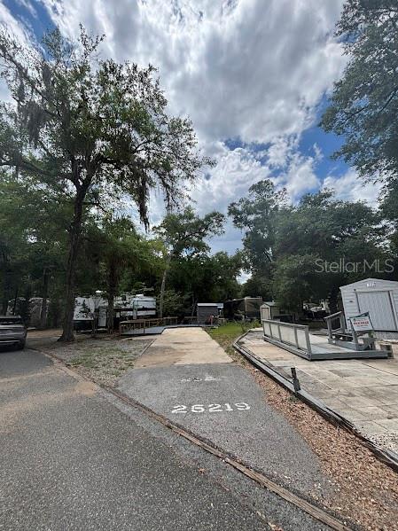 DEEDED RV LOT -  Escape to nature at Salt Springs Resort in Florida—a gated RV lot for sale in a tranquil, nature-rich setting. Nestled in the heart of the 383,000-acre Ocala National Forest and along the shores of picturesque Little Lake Kerr, this resort offers a serene escape surrounded by century-old oaks draped in Spanish moss. Salt Springs Resort is a blend of small-town charm and abundant natural beauty.
Enjoy a relaxing lifestyle with top-tier amenities: a spacious lakefront lodge, boat ramp, fishing dock, adult and family pools, a children’s pool, and a spa. Stay active with tennis, basketball, shuffleboard, horseshoes, billiards, and more. Hikers will love direct access to the Florida National Scenic Trail, and anglers will be in paradise with nearby top bass fishing lakes. Whether you bask in the blue waters of Little Lake Kerr or explore the vast wilderness of the Ocala Forest, this is a one-of-a-kind getaway. Come and experience the charm of Salt Springs Resort and start making lifelong memories today.