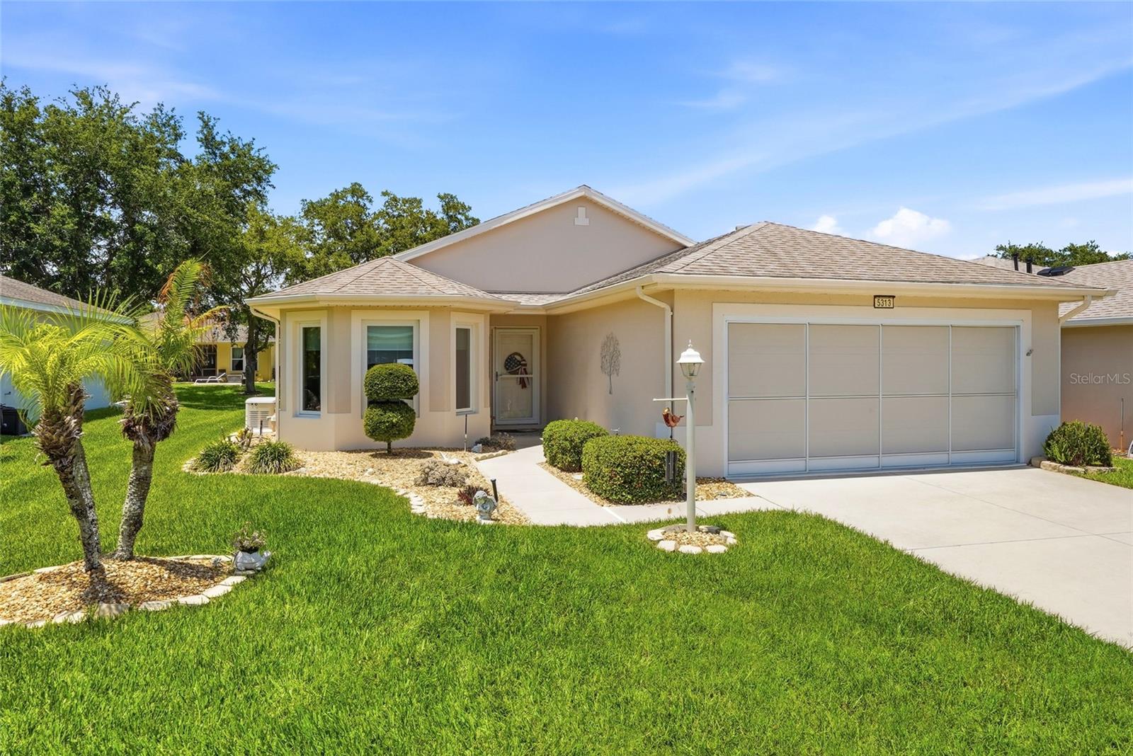 Welcome to easy Florida living in this beautifully maintained home located in a sought-after 55+ community! Move-in ready and meticulously updated, this open-concept residence offers a spacious layout designed for both everyday living and entertaining, complete with an enclosed lanai that provides the perfect spot to relax and enjoy the Florida lifestyle year-round.

The updated kitchen features stunning quartz countertops (2023), Renewal by Andersen windows (2025), and a full suite of stainless steel appliances installed in 2022. French doors (2018) bring in abundant natural light and create a seamless connection to the enclosed lanai.

Recent big-ticket upgrades include a new roof (2019), HVAC system and furnace (2022), hot water heater (2022), whole-house Generac generator (2023), garage screen (2023), and updated washer and dryer. Updated lighting and ceiling fans enhance the living room, kitchen, primary suite, guest bath, and third bedroom, while a new garage door opener was installed in 2016.

Fresh exterior paint (2023) and interior paint (2024) complete the home's modern, well-maintained appeal. Beyond the home, residents enjoy an exceptional amenity-rich lifestyle with a resort-style clubhouse, heated pool and spa, fitness center, tennis and pickleball courts, walking and biking trails, social clubs, planned activities, and a full calendar of events designed to bring neighbors together and embrace the best of Central Florida living. Conveniently located near shopping, dining, and major roadways, this home offers the perfect combination of comfort, convenience, and community.