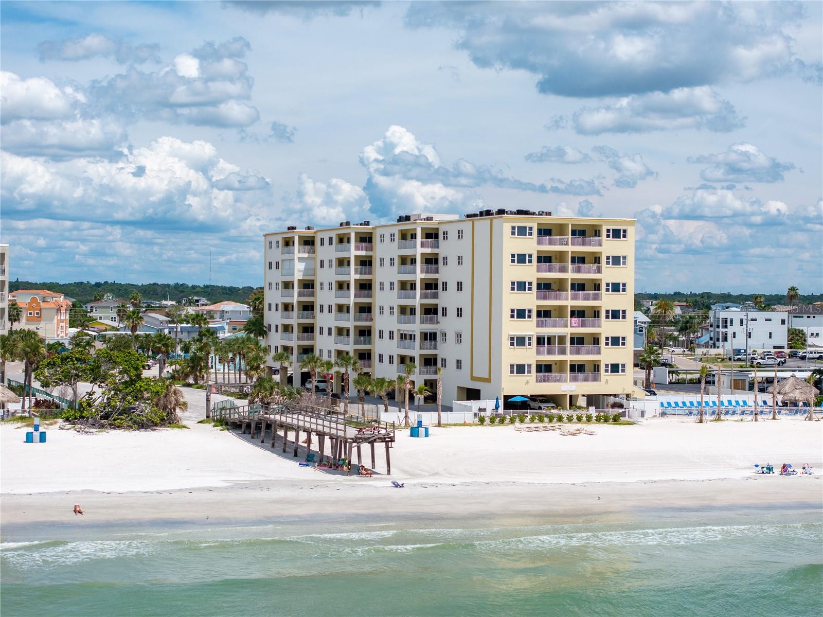BEACHFRONT LIVING WITH THE PERFECT LAYOUT FOR FAMILY AND GUESTS. Welcome to Anglers Cove, where Gulf-front views, spacious living areas, and a thoughtfully designed floor plan create the ultimate coastal retreat. This 3-bedroom, 3-bath residence offers a rare configuration with two private ensuite guest bedrooms that can be separated from the main living area, making it ideal for traveling families, visiting guests, or multi-generational living. Wake up to breathtaking Gulf views, spend your days on the sugar sand beach just steps away, and end each evening with unforgettable sunsets from your beachfront residence. The spacious floor plan offers the perfect balance of open-concept living and private retreats, allowing everyone to enjoy their own space while gathering together in the heart of the home.  Whether you're searching for a primary residence, seasonal getaway, or beachfront escape to share with family and friends, this exceptional Anglers Cove residence offers the location, layout, and lifestyle buyers dream about on Florida's Gulf Coast.