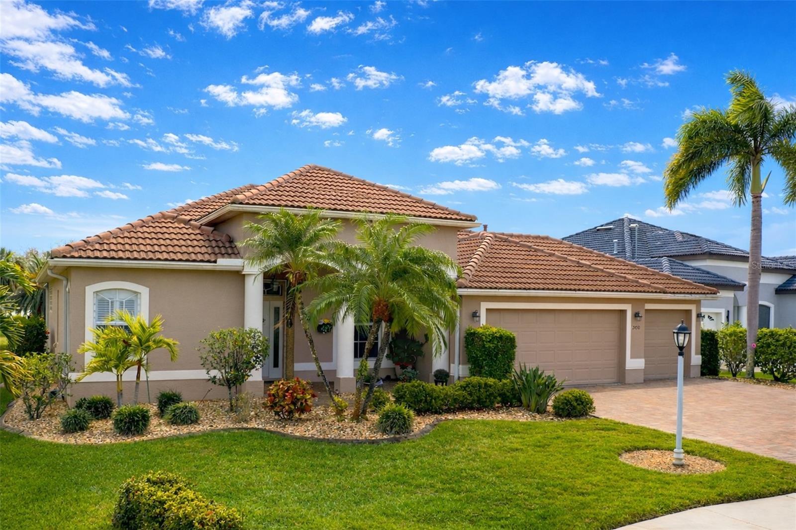 Welcome to your private Florida retreat in the highly sought-after gated community of Bobcat Trail in North Port. This impeccably maintained 3-bedroom, 2-bath pool home with a 3-car garage offers the perfect blend of comfort, style, and effortless indoor-outdoor living.
From the moment you step inside, you’re greeted with tranquil pond and preserve views and an open, airy layout designed for both relaxation and entertaining. Expansive 90-degree pocket sliding glass doors disappear seamlessly, blurring the lines between indoor living and your outdoor oasis.
The beautifully remodeled kitchen is the heart of the home, featuring granite countertops, a gas range, and modern finishes, all flowing effortlessly into the spacious living area—ideal for hosting or simply enjoying quiet evenings with a view.
The primary suite is a true retreat, complete with engineered wood flooring, generous walk-in closets, private lanai access, and a spa-inspired en-suite bath featuring a soaking tub, walk-in shower, and private water closet.
Step outside and experience resort-style living at its finest. Your expansive covered lanai and outdoor kitchen—complete with gas grill and refrigerator—overlook a stunning solar-heated pool with a cascading waterfall, all set against peaceful pond and preserve views that create a sense of total privacy.
Recent upgrades include a new roof (2024) and A/C system (2023), offering peace of mind for years to come. Additional highlights include tile flooring throughout, a whole-home RainSoft water softener system, and a spacious 3-car garage. Bedroom two features its own mini-split A/C system, providing customized comfort for guests.
Residents of Bobcat Trail enjoy low HOA fees and access to exceptional amenities, including a clubhouse, resort-style pool, fitness center, pickleball and tennis courts, all within a secure gated setting.
This is more than a home—it’s a lifestyle of comfort, privacy, and effortless Florida living.