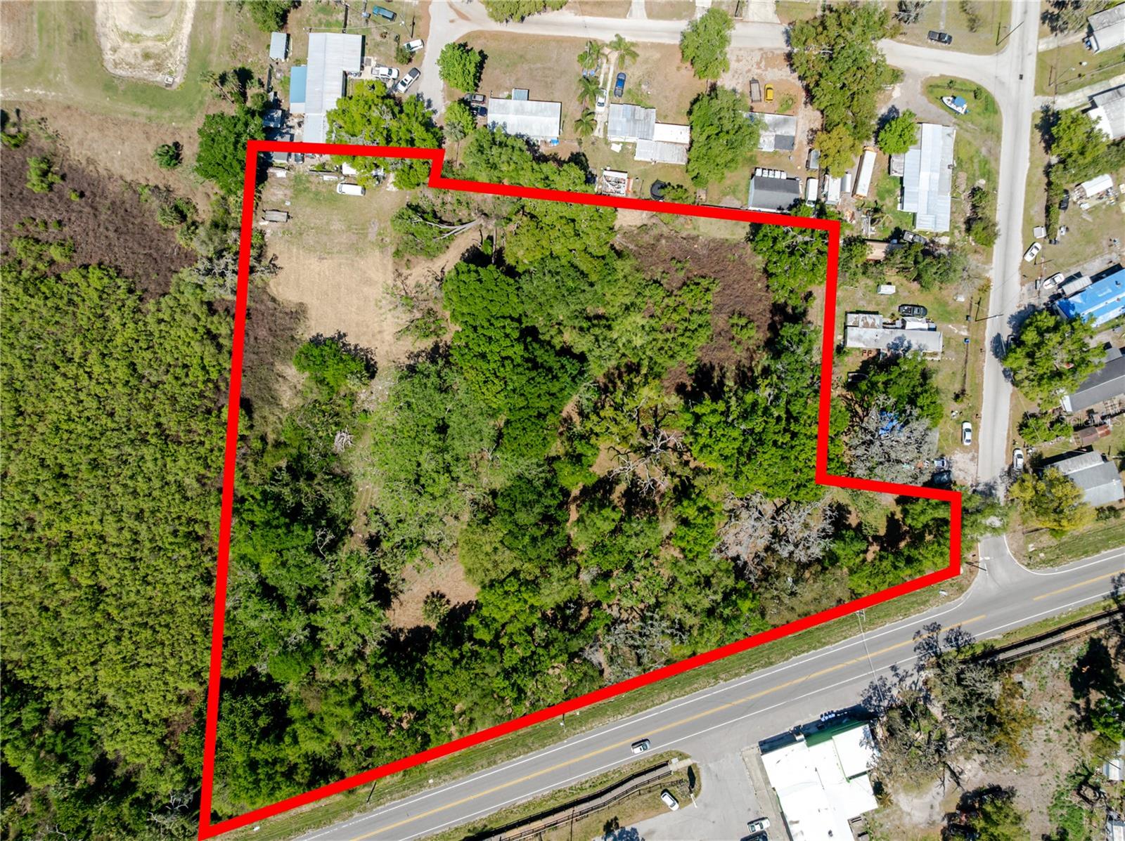 OVER 4 ACRES OF BEAUTIFUL LAND IN THE HEART OF Seffner! Perfectly positioned between Tampa and Lakeland, this property offers an unbeatable central location with convenient access to major corridors, shopping, and dining. Currently zoned AR/AR, the property presents potential opportunities for future rezoning (buyer to complete all due diligence). Featuring a highly desirable layout with plenty of mature trees, this 4+ acre parcel offers both privacy and flexibility for a variety of potential uses. Surrounded by custom-built homes and well-developed communities, the location continues to see strong growth and demand. Located within highly sought-after school districts, this property is an excellent opportunity to build, invest, or hold for future potential. Don’t miss your chance to own a rare piece of land in one of the most desirable areas of Seffner—call today for more information!