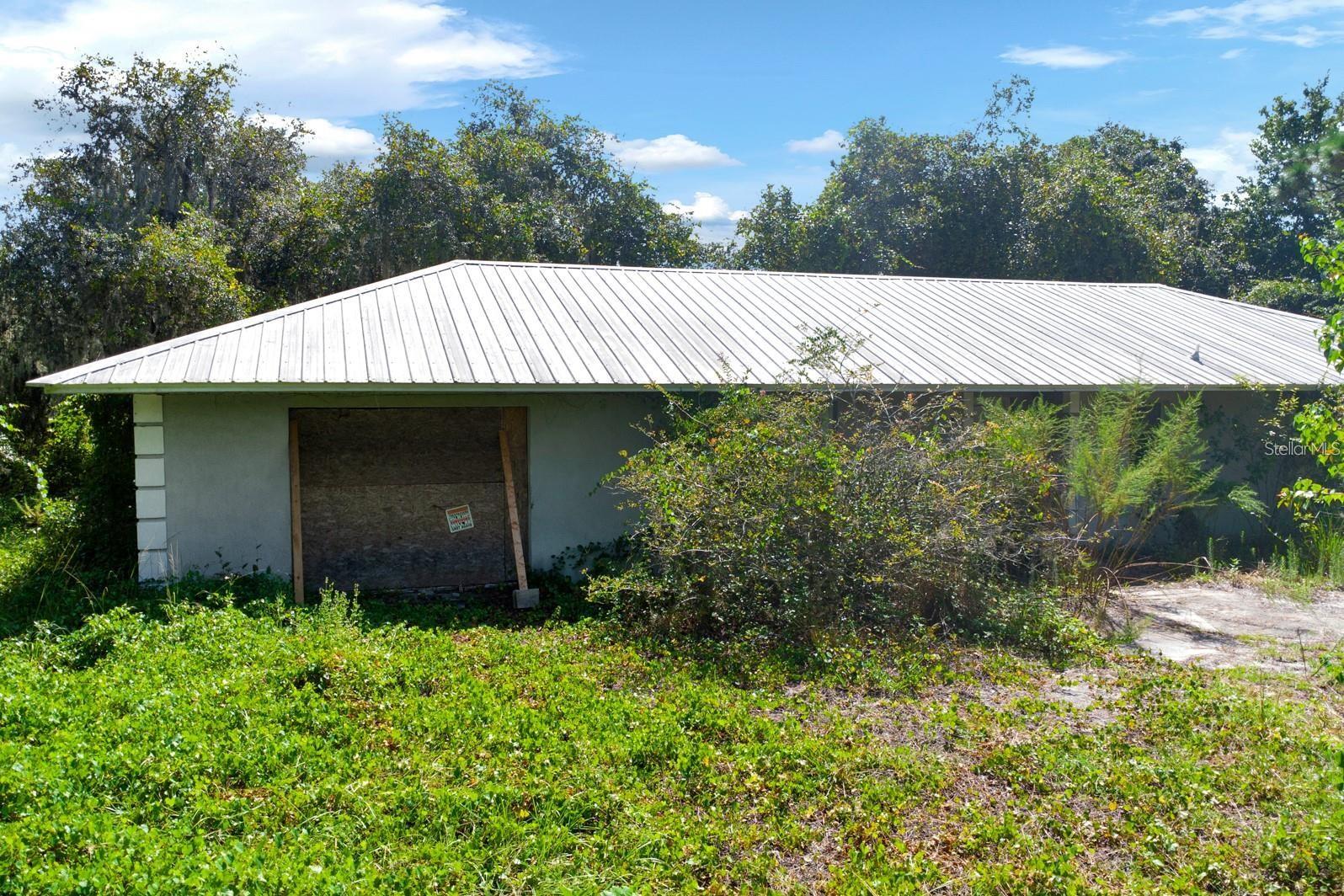 Endless Potential on 5.84 Acres – Prime Location Near Lake Nona Unlock the possibilities with this expansive 5.84-acre property, ideally located just minutes from Lake Nona Medical City, Orlando International Airport, and major growth corridors. Whether you're envisioning a private estate, investment opportunity, or future development, this land offers the freedom to bring your vision to life — with no HOA restrictions to limit your creativity. The existing 3-bedroom, 2-bath home offers nearly 2,000 sq ft of living space and is ready for a full renovation, making it a perfect blank canvas for customization or expansion. With acreage this size in such a strategic location, opportunities like this are rare. Go and show. Explore the potential firsthand — this property won’t last long!
