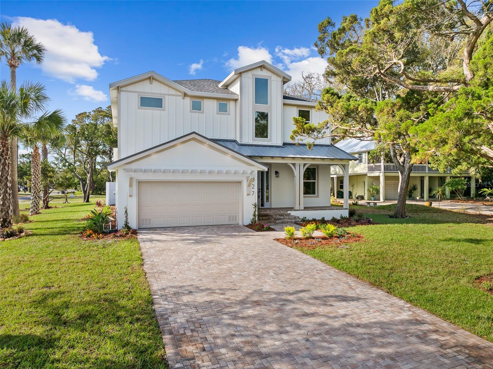 New Anastasia Island Home | Walk to Beach | No HOA | 4BR Potential. Great Short Term Rental Potential. ROOM FOR A POOL AND ACCESSORY DWELLING UNIT. Inquire about this option. Once you peruse the photos on this Anastasia Island home, you will want to see it in person. this home features four-bedroom potential (an upstairs Loft or downstairs private study that can convert into a fourth bedroom), three full baths, and a formal dining area, this home is great for year-round living or seasonal use. Impact Windows provide added peace of mind, while a tall open foyer creates a striking first impression. The kitchen with an adjacent Cafe is ideal for everyday living and entertaining, and the owner's Suite offers large walk-in closets. A covered lanai completes the home with seamless indoor-outdoor living. Ask about a pool package available for this home.

Area Features: 
Walk to Beach
Neighborhood Boat Ramp 2 min. away
No HOA
Nearby Restaurants
Historic St. Augustine - 20 min.
Excellent Area Restaurants
Island Living offering Intracoastal and Ocean access