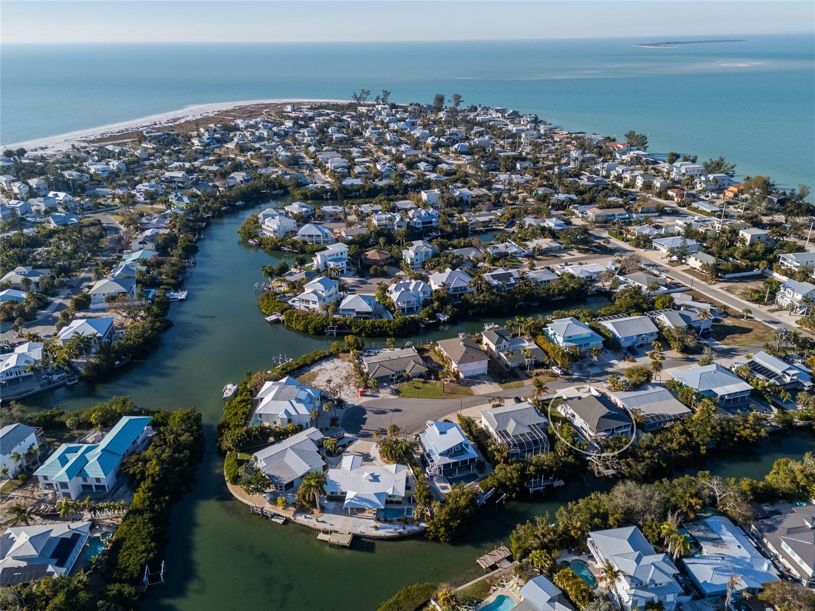 Located on the north end of Anna Maria, this elevated canal-front home is a true boater’s paradise with direct water access and a private dock. This 4-bedroom property underwent an extensive interior remodel, showcasing modern upgrades and coastal living at its finest. The open-concept layout is filled with natural light and offers comfortable living spaces ideal for both everyday living and vacation enjoyment. Step outside to an expansive back deck overlooking the peaceful canal — the perfect setting for relaxing or entertaining. Outdoors, a new pool and refreshed entertaining area further enhance the Florida lifestyle. Ideally situated near beaches, dining, and shopping, this home captures the very best of Anna Maria Island waterfront living and is perfectly suited as a full-time residence or a short-term rental investment.