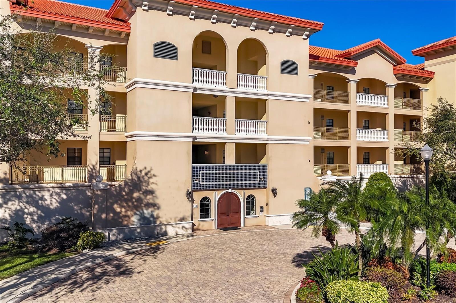 Welcome to your dream condo in the heart of Lakewood Ranch! This stunning 3-bedroom, 2.5-bathroom residence boasts over 1,700 square feet of luxurious living space, perfect for both comfort and style. As you step inside, you are greeted by an inviting foyer with vaulted ceilings and an open floor plan adorned with elegant luxury vinyl flooring in the bedrooms and beautiful ceramic tile in the main areas, creating a seamless flow throughout.

The spacious living area is perfect for entertaining or relaxing, while the well-appointed kitchen offers ample space and granite countertops, making meal preparation a delight. The generous laundry room adds convenience to your daily routine.

Enjoy peace of mind with hurricane impact windows that provide both safety and energy efficiency. The convenience of an elevator in the building allows for easy access to your unit. Step outside onto your private enclosed balcony, a serene oasis perfect for morning coffee or evening sunsets, where you can unwind and take in the beautiful surroundings.

The building features a new roof installed in 2022, ensuring durability and peace of mind. This amazing unit comes with one covered deeded parking space and extra storage. The community includes a clubhouse with a fitness center, a resort-style pool and spa, and a grill area by the pool, perfect for entertaining family and friends.

This condo is not just a home; it’s a lifestyle. Ideally located close to Lakewood Ranch Hospital and within minutes from Main Street Lakewood Ranch, you’ll have access to a vibrant community filled with activities, restaurants, and shops. With easy access to I-75 and just minutes from UTC Mall, this location is truly unbeatable. Don’t miss the opportunity to make this exquisite condo your own! 
No Pending Assessments. Fully funded reserves.