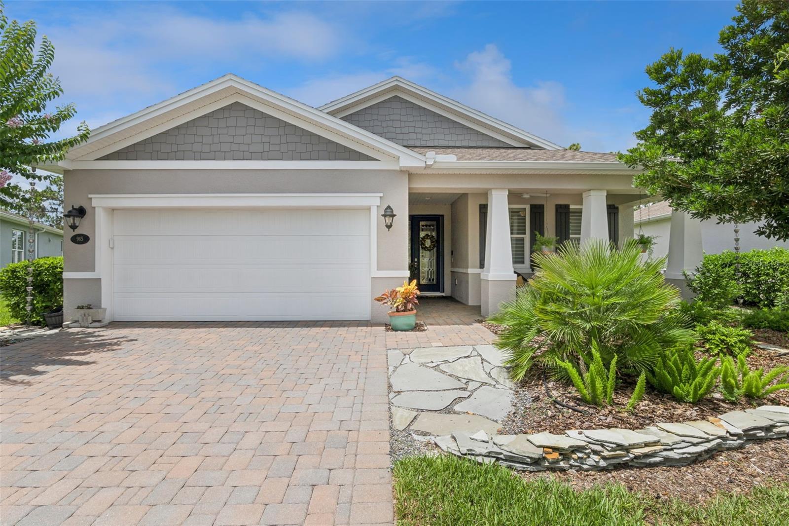 Stunning, Light & Bright Kolter Lily with a front porch & a 40’ x 22’ brick paver screened lanai on a pie-shaped homesite providing total privacy overlooking a conservation area within the 55+ Victoria Gardens neighborhood. Homeowner selected many upgrades to enhance its functionality! Personalized features include impact resistant windows/doors, 24’9” air- conditioned garage, whole home water softener, central vacuum system, custom closet organizer for primary bedroom & built-in storage cabinets, laundry tub & folding table in the utility room. This 2 Bedroom 2 Bath plus Den floorplan has a GREAT ROOM layout. The gourmet kitchen is a chef’s dream that offers 42” wood cabinets w/ crown molding, under & above cabinet lighting, Pull-out drawers, Quartz countertops, large breakfast island w/ pendant lighting above, single basin kitchen sink, convection double wall oven/microwave, 4-burner natural gas cooktop, range hood, tile backsplash, wine refrigerator, walk-in pantry & GE Profile stainless-steel appliances. Porcelain tile flooring flows throughout the entire home. Interior details include crown molding, 5” baseboards, leaded glass front entry door & sliding screen, recessed lighting & remote-controlled shades throughout majority of the home. The 14’ x 17’ primary bedroom offers a tray ceiling, ceiling fan, crown molding & a fantastic conservation area view. En suite bathroom provides raised height separate Quartz countertop vanities, glass enclosed walk-in shower w/ bench seat & a 13’6” x 5’6” walk-in closet. Second bedroom offers a ceiling fan & Shangri-la blinds for privacy. The 12’6” x 11’6” Den offers the flexibility to be a game room or office space. Homeowner will enjoy having their morning coffee or late afternoon beverage on the 40’ x 22’ screen enclosed covered lanai w/ recessed lighting, wall mounted TV & 2 ceiling fans. The 19’ x 24’9” garage provides additional space for larger vehicles, 2 ceiling mounted storage racks & a mini split for air conditioning. All appliances stay with the home. Victoria Garden residents have access to their own social Private Clubhouse. HOA fee includes lawn care, Spectrum HFC TV & internet and reclaimed water for yard irrigation and access to all community amenities. Community is within 1 mile of I-4 that offers great access to the east coast beaches, Orlando (40 minutes) and 3 International airports within 1 hour.