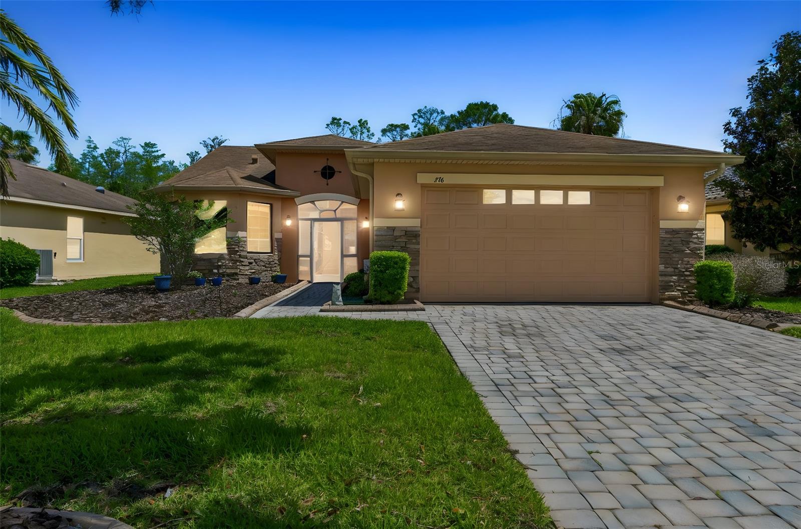 Welcome to this beautifully upgraded Sarasota model, ideally situated on a peaceful conservation lot in a quiet neighborhood just moments from the Palms Resort amenities. This meticulously maintained home offers both comfort and style with thoughtful upgrades throughout. Enjoy energy efficiency and quality with top-of-the-line Pella windows (2010) and a newer HVAC system (2018). Inside, you’ll find engineered hardwood flooring laid on the diagonal in the Great Room and Dining Room, complemented by ceramic tile in the kitchen and bathrooms, and plush carpeting in the bedrooms. Architectural details include 8-foot doors, rounded corners, and elegant 5 1/4-inch baseboards throughout. The inviting curb appeal features a screened front porch and a beautiful leaded glass front door. The kitchen is a chef’s delight, showcasing quartz countertops, 42-inch staggered upper cabinets with crown molding, pull-out drawers, stainless steel appliances, recessed lighting, and a spacious walk-in pantry. The Primary Suite is a relaxing retreat with a tray ceiling, bay window, and an en-suite bathroom featuring dual sinks, a raised vanity, and an upgraded tiled walk-in shower with seamless glass enclosure and built-in bench. Guest Bedroom #2 also features a charming bay window. Additional highlights include a laundry room with washer, dryer, and wash basin, as well as a covered and screened lanai overlooking serene conservation views—perfect for relaxing or entertaining. The extended 2-car garage provides ample space for storage and convenience. This exceptional home combines elegance, functionality, and a prime location—don’t miss your opportunity. Solivita is a premier 55+ community, offering residents an exceptional lifestyle with state-of-the-art amenities. Enjoy a fully equipped fitness center, dance and aerobics studios, and an impressive array of recreational options including 14 heated swimming pools, two heated spas, tennis courts, pickleball courts, shuffleboard, bocce ball, billiards, and an art gallery. The community also features three on-site restaurants and two championship 18-hole golf courses. With a full calendar of activities and events, there’s always something new to explore and enjoy. This home is conveniently located near a hospital and medical office complex, and shopping center!