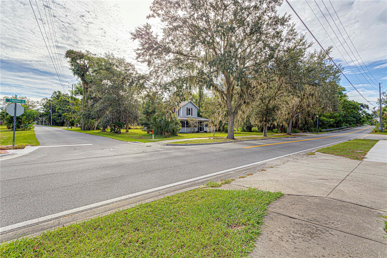 Endless possibilities await with this prime 8+ acre parcel on S. Highland Street, the "Gateway to Mount Dora". Zoned Mixed-Use, this property offers flexibility for multi-family, retail, offices, dining, medical, educational facilities, or a “Live, Work, Play” development. Surrounded by majestic oak trees, it’s the perfect blank canvas for a visionary project, or a family compound with a potential retail component in an unparalleled location. Just a short stroll to Historic Downtown Mount Dora, known as Festival City, for its nationally recognized art shows, fairs, concerts and cultural events, this location combines small-town charm with city convenience.  Just minutes from this parcel, you’ll discover a lifestyle unlike any other: shopping through quaint streets brimming with boutiques and art galleries, savoring world-class dining, enjoying cozy wine bars, and celebrating year-round at Mount Dora’s famous festivals. All of this makes this location an UNMATCHED development opportunity.
Don't snooze on this one!  This is a rare opportunity to create something truly special at the front door of one of Central Florida’s most celebrated destinations!  Ask us about the proposed "Rails to Trails" (Tav-Dora Trail) project, which will make this property even MORE valuable!  For future development, this property is less than a mile from HWY 441, which makes this an opportunity like no other in Mount Dora.  Take a look at this one today, and watch your investment grow! Additional Photos coming SOON!