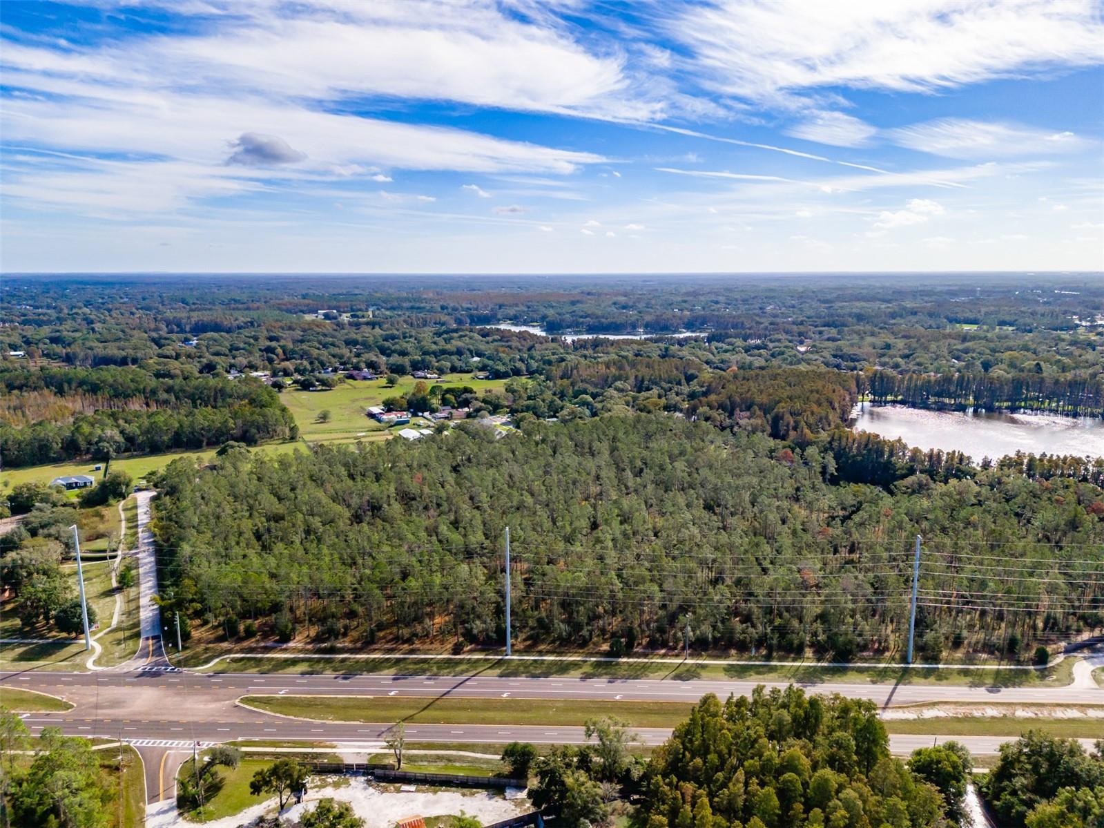 Back on the Market! Now is your chance to purchase this beautiful piece of property!
Embrace this extraordinary opportunity to own a sprawling land parcel nestled along the shores of pristine Lake Brooker. If you are a developer looking to build homes on one acre lots, in the heart of Lutz, in the Steinbrenner school district, this could be the property for you. If you are looking for privacy to build your Dream Estate Home, this could be the property for you too! This property is high and dry with Lake Frontage on Lake Brooker, a 24- acre private ski- lake.  Conveniently located on N. Dale Mabry Highway, you are surrounded by nature, yet only minutes away from shopping, restaurants and major highways. Please see the attached survey for boundary lines as there is a discrepancy in the legal description, the updated survey will be recorded with or prior to the sale of the property.