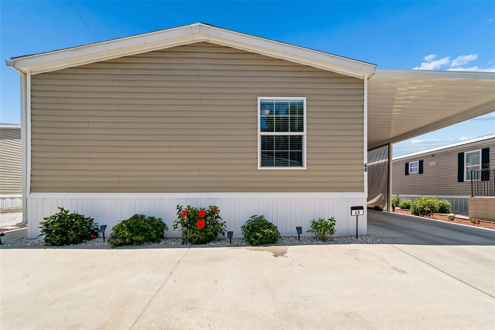 ---OWN THE LAND SHARE---NO LOT RENT---NO MONTHLY CO-OP FEES---UTILITIES INCLUDED--WATER/SEWER/TRASH AND SPECTRUM PACKAGE!!!!  OWNERS MOTIVATED!!! 
 Welcome home to this stunning 2022 Fleetwood double wide located in the ALL- AGE, PET FRIENDLY community of Indian Rocks Estates. JUST MINUTES TO THE BEACH, this PRACTICALLY BRAND NEW beautifully maintained 3 bedroom, 2 bathroom home offers a spacious open concept floorplan designed for comfortable everyday living and effortless entertaining. When you purchase this home, you OWN the HOME and a SHARE !!! SHAREHOLDERS DO NOT PAY LOT RENT, NO MAINTENANCE FEES!!!  This home and community are not only centrally located to so much Pinellas has to showcase, but you are also just a bike ride from Parks, Publix, Restaurants, and more. Quick commute to the Airport, Tampa or visit the sites of St. Petersburg. Take the trolley for a relaxing day visiting our World Famous Sugar Sand beaches. 

Step inside to discover luxury vinyl flooring throughout, a desirable split bedroom layout, and bright inviting living spaces enhanced with custom window treatments and abundant natural light. The well-appointed kitchen flows seamlessly into the dining and living areas, creating the perfect gathering space for family and friends.

Additional highlights include an inside laundry area off the Kitchen, expanded carport, Tuff Shed for additional storage, and plenty of space for all your Florida lifestyle needs. Enjoy true peace of mind with hassle-free living with having a 2022 roof, HVAC system, and appliances already in place. Non- Flood zone and a 12 X 40 expanded carport too!

Step outside to your own backyard oasis complete with custom pavers, an easy-maintenance yard, and a relaxing patio area — the perfect setting to enjoy the Florida lifestyle year-round.

Ideally located just 3 miles from the beautiful Gulf beaches and close to parks, the Pinellas Trail, recreation centers, schools, shopping, restaurants, and so much more. Indian Rocks Estates also offers exciting community amenities including a playground, on-site office, a clubhouse and A NEW POOL coming soon!

Even better, enjoy affordable Florida living with NO LOT RENT!!!! This resident-owned share community includes utilities, Spectrum cable, and internet package at no additional cost, making this home an exceptional value.

This move-in ready home combines modern comfort, low-maintenance living, and an unbeatable location all in one exceptional package.
ASK ME ABOUT FINANCING!!!!
So do not delay and make this hassle free home yours full-time or your Florida get away piece of Paradise!!