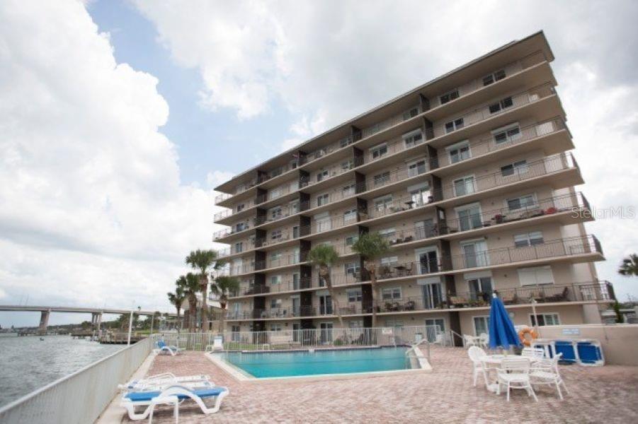 Waterfront Condo with Stunning Intracoastal Views in the Heart of New Smyrna Beach!

Experience the best of coastal living in this beautifully maintained 2-bedroom, 2-bath condominium located in the highly desirable Captain’s Quarters community. Perfectly situated at 101 N. Riverside Drive, Unit 202, this second-floor residence offers breathtaking views of the Intracoastal Waterway and the community pool from its spacious private balcony—the perfect spot to enjoy your morning coffee as you watch the sunrise, watch boats glide by, periodically catching a glimpse of the manatees and dolphins that frequent the area along with an occasional view of the Cape Canaveral rocket launches.

Inside this 1000 sq ft unit, you’ll find a bright, inviting floor plan with numerous recent updates, including:

New HVAC (2024)
New kitchen appliances (2025)
New windows (2022)
Premium covered parking space (A-2)

Just steps from historic Canal Street, you’ll enjoy easy access to New Smyrna Beach’s charming boutiques, award-winning restaurants, art galleries, marina, parks, farmers market, and year-round festivals. The beach is just a short drive or bike ride away, giving you the best of both riverfront and coastal living.

Whether you’re looking for a year-round residence, a seasonal escape, or a low-maintenance Florida retreat with monthly HOA dues at $525, this move-in-ready waterfront condo offers an exceptional combination of location, comfort, and breathtaking views.

Schedule your private showing today and discover why Captain’s Quarters is one of New Smyrna Beach’s most desirable waterfront communities.