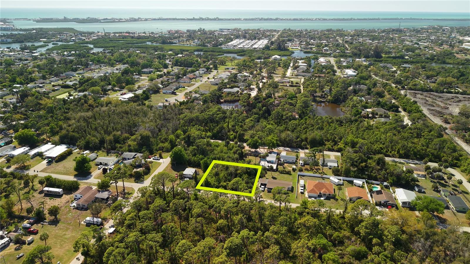 Vacant 0.29-acre residential lot on Palmetto Street in Englewood ready for your new home, offering 100' of frontage and 125' of depth. Zoned RSF-4 with access to public water, sewer, and electric available at the street - no well or septic needed. Clean environmental report on file. With some clearing and clean up, this is a great lot for a custom single-family build. Minutes from Englewood Beach on Manasota Key, Stump Pass Beach State Park, Old Englewood Village dining and shops along Dearborn Street, and Lemon Bay waterfront access. A rare opportunity to build in an established coastal neighborhood at an accessible price point! Address is for location purposes only and is not a legal situs. Buyer should verify all details. Listing agent has an ownership interest in the property.