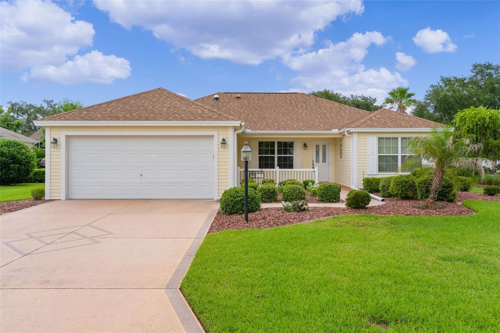 ~2020 Roof~ ~2019 HVAC~ ~2018 HOT WATER HEATER~ ~NO BOND~ ~CORNER LOT~ ~5 SOLAR TUBES~ ~ROOM FOR POOL~ ~FURNISHED~ ~NO CARPET~
Welcome to this beautifully maintained BOUGAINVILLEA in the happy Village of BELVEDERE, ideally situated on a spacious CORNER LOT on a quiet street that is a CUL DE SAC. Step inside to discover HARDWOOD flooring everywhere but the laundry room, complemented by soaring VAULTED CEILINGS and abundant natural light. The spacious living room features a ceiling fan and a SOLAR TUBE, creating a bright and inviting gathering space. The kitchen is both stylish and functional with a center island, TILE backsplash, recessed lighting, a SOLAR TUBE, and ample cabinetry, making it perfect for everyday living and entertaining. The adjoining dining area showcases vaulted ceilings, adding to the home's open and airy feel. The spacious primary suite offers ceiling fan and 2 WALK-IN closets. The ensuite bath features a TILED WALK-IN shower, HI-DEF countertops, private commode, and SOLAR TUBE that fills the space with natural light. 2 comfortable guest bedrooms each include ceiling fans and built-in closets. The guest bath provides TILED tub/shower combination, HI-DEF countertop, another SOLAR TUBE, creating a bright and welcoming space for family and visitors. Additional conveniences include an INTERIOR LAUNDRY ROOM with extra storage, making organization a breeze. One of the home's standout features is the ENCLOSED LANAI under heat and air, complete with blinds and a ceiling fan, creating valuable year-round living space. Step outside to the adjoining BIRDCAGE enclosing a STAMPED CONCRETE PATIO, with privacy hedge creating the perfect setting for relaxing, entertaining, or enjoying Florida's beautiful weather. A whole-house stereo system, including the lanai, adds the finishing touch for effortless indoor-outdoor entertaining. The oversized 2-car garage is loaded with desirable features, including EPOXY flooring, built-in cabinets, a workbench, attic stairs, and a pull-down garage screen, providing generous storage and functionality. With beautiful hardwood floors, numerous upgrades, exceptional outdoor living spaces, and an outstanding Belvedere location, this Bougainvillea is a wonderful opportunity to enjoy the very best of The Villages lifestyle. It is super close to the Belvedere Pool, a short ride to Glenview Country Club, Savannah Center, Arnold Palmer Country Club, and Laurel Manor Regional Rec Center. You are well located among unlimited dining and shopping including Costco, Publix, Fresh Market, Starbucks, Culvers, Tap House Social and Bonefish Grill.