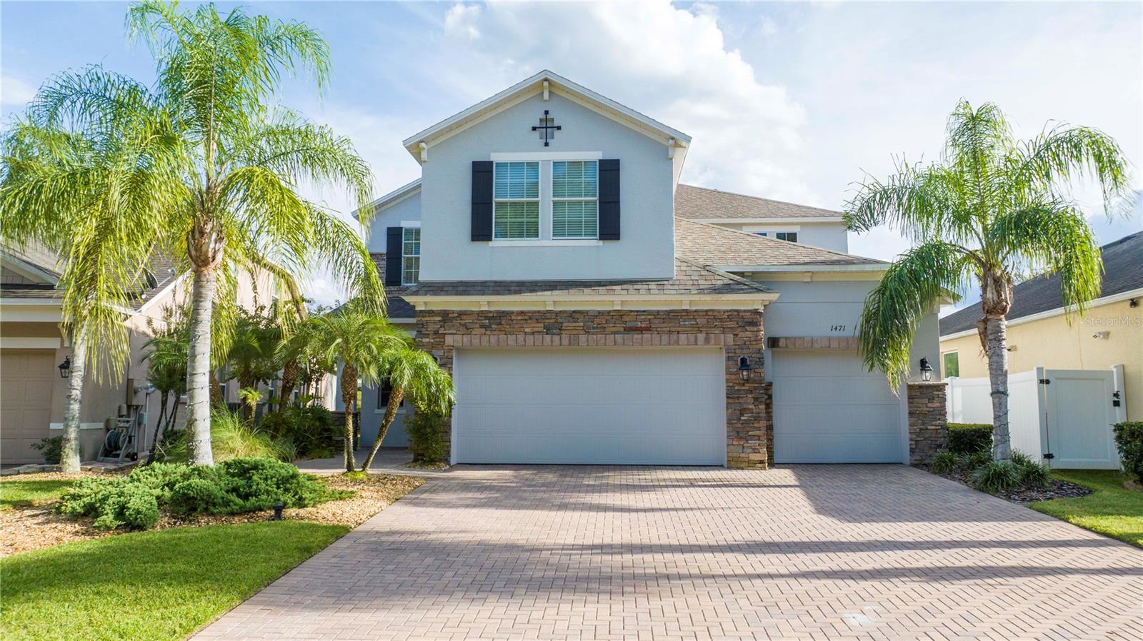 Located close to Major Highways and less than 15 miles to Orlando Airport, this inviting home is in a Gated Community, and  has 4 bedrooms, Loft, 3 baths, 3 CAR GARAGE, Covered Lanai and fenced in SWIMMING POOL. Features a FORMAL DINING with Kitchen open to Breakfast area and Great Room. Kitchen has 42" Maple Cabinets w/Crown Molding, GRANITE Countertops, STAINLESS STEEL Appliances including DOUBLE OVEN & Refrigerator and Walk-in Pantry. Guest Suite on 1st Floor. Master Bedroom has attached SITTING ROOM. Master Bath features large Walk in Closet, Privacy Lavatory, Granite Countertops and GARDEN BATH with Soaking Tub and Glass Enclosed Shower. HARDWOOD Floors in Foyer, Dining Room, Great Room, Kitchen, & downstairs Bedroom. Woodland Lakes Preserve offers residents a Playground and Community Pool. Grocery Stores located within half a mile and Waterford Lakes Town Center only 2 miles away.