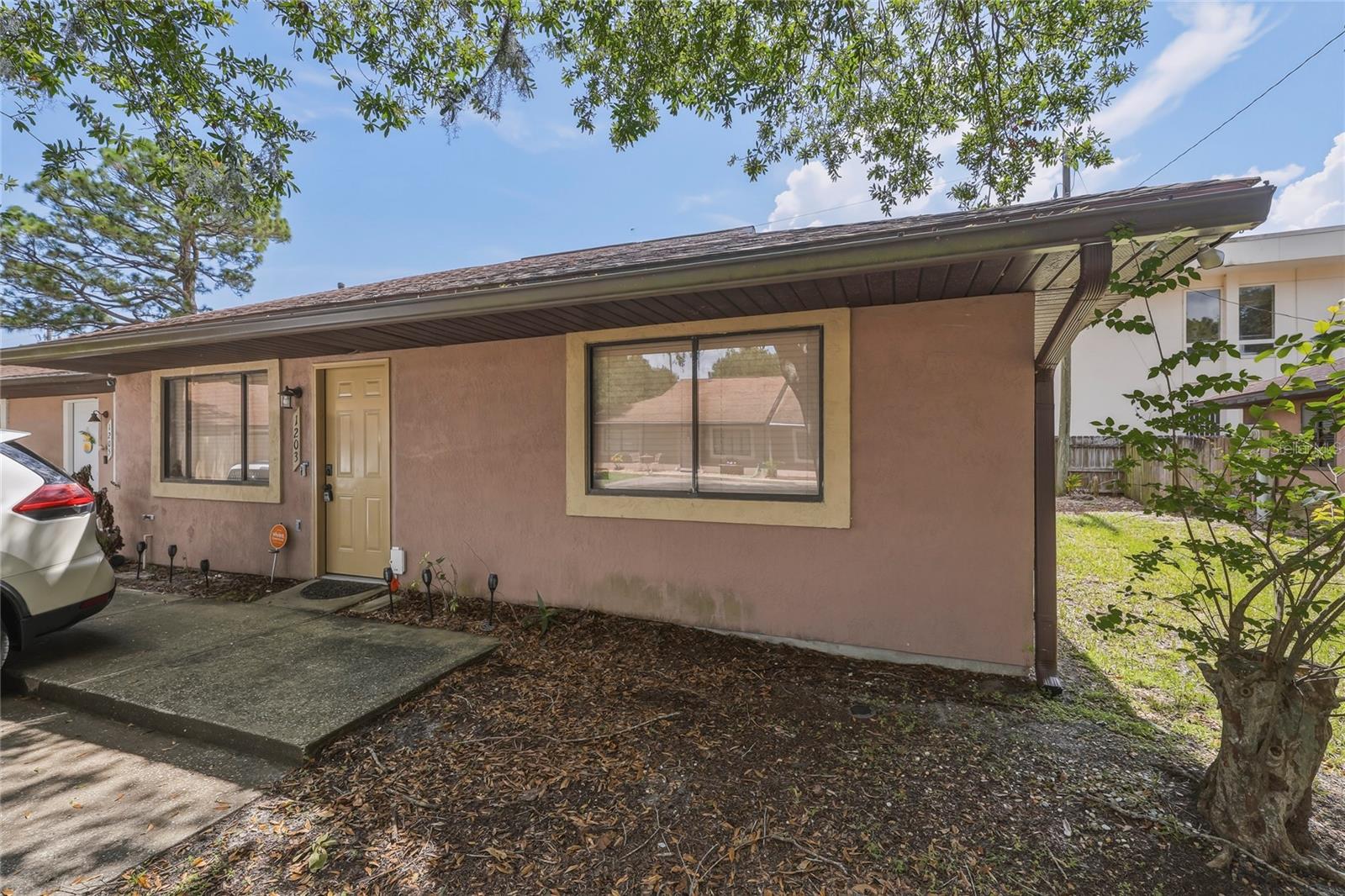Check out this adorable 3 bed, 2 bath updated home located in the Shady Pines community. Home features new luxury vinyl plank flooring, baseboards, freshly painted interior, updated kitchen, and updated bathrooms. Image yourself relaxing or entertaining on your screened in back patio. This amazing home is clean and ready for you to move in with no CDD to worry about and a Low HOA. Shady Pines is conveniently located close to Hwy US-1, I-95, Kennedy Space Center, and the beach!