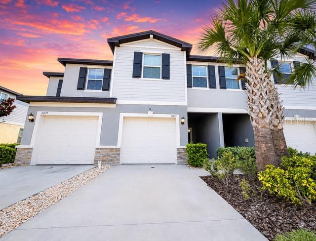 One or more photo(s) has been virtually staged. SOME PHOTOS ARE VIRTUALLY STAGED. Welcome to one of the most desirable locations in Townes at Lake Thomas—offering peaceful conservation views, no rear neighbors, and the low-maintenance lifestyle today’s buyers are looking for.

This move-in-ready 3-bedroom, 2.5-bath townhome combines comfort, style, and functionality with a thoughtfully designed open-concept floor plan. The spacious living and dining areas are perfect for entertaining, while the beautifully updated custom stone feature wall with an electric fireplace creates a warm and inviting gathering space.

The kitchen overlooks the main living area, allowing for effortless everyday living and connection with family and guests. Sliding glass doors lead to the screened lanai, where you can enjoy your morning coffee or unwind after a long day while taking in the tranquil conservation backdrop and added privacy of having no rear neighbors.

Upstairs, the generous primary suite features a walk-in closet and private en-suite bath. Two additional bedrooms and a full bath provide plenty of space for family, guests, a home office, or a hobby room.

Additional features include overhead garage storage, abundant natural light, and pride of ownership throughout.

Residents of Townes at Lake Thomas enjoy maintenance-free living with HOA-covered exterior maintenance and lawn care, along with community amenities including a resort-style pool and dog park.

Ideally located in the heart of Land O’ Lakes, you’ll enjoy convenient access to SR 54, the Suncoast Parkway, Tampa International Airport, shopping, dining, medical facilities, and highly rated Pasco County schools.

Opportunities to own a conservation-view townhome with this level of privacy and convenience don’t come along often. Schedule your private showing today and discover why so many buyers love calling Townes at Lake Thomas home.