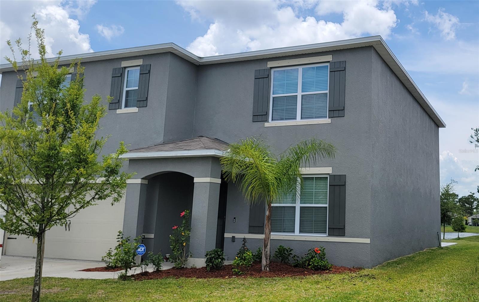 Location! Location! Priced below appraised value! Just minutes from the beach, shopping, dining, parks, schools and the Interstate. Newer home built in 2021 in a quiet family neighborhood. Enjoy coffee in the morning with a pond view on a new stamped concrete patio the length of the home.  The Hayden plan is one of the most popular two-story floorplans built by DR Horton. Five bedrooms, three baths, one bedroom and bath is on the lower level.  This is a great place to create a lifetime of family memories while the little ones grow up. Includes all appliances with washer and dryer. Home comes with smart technology including: Home Hub Touchscreen panel with App control for thermostat, outdoor lighting, front door lock, smoke detectors, and video doorbell.  High Energy 15 Seer A/C, Dual Pane Low E Windows, 10 year home warranty and renewal termite bond with Massey. Lawn irrigation is hooked up to reclaimed water. Schedule your appointment today!  Some photos have been virtually staged. ;Water: City
