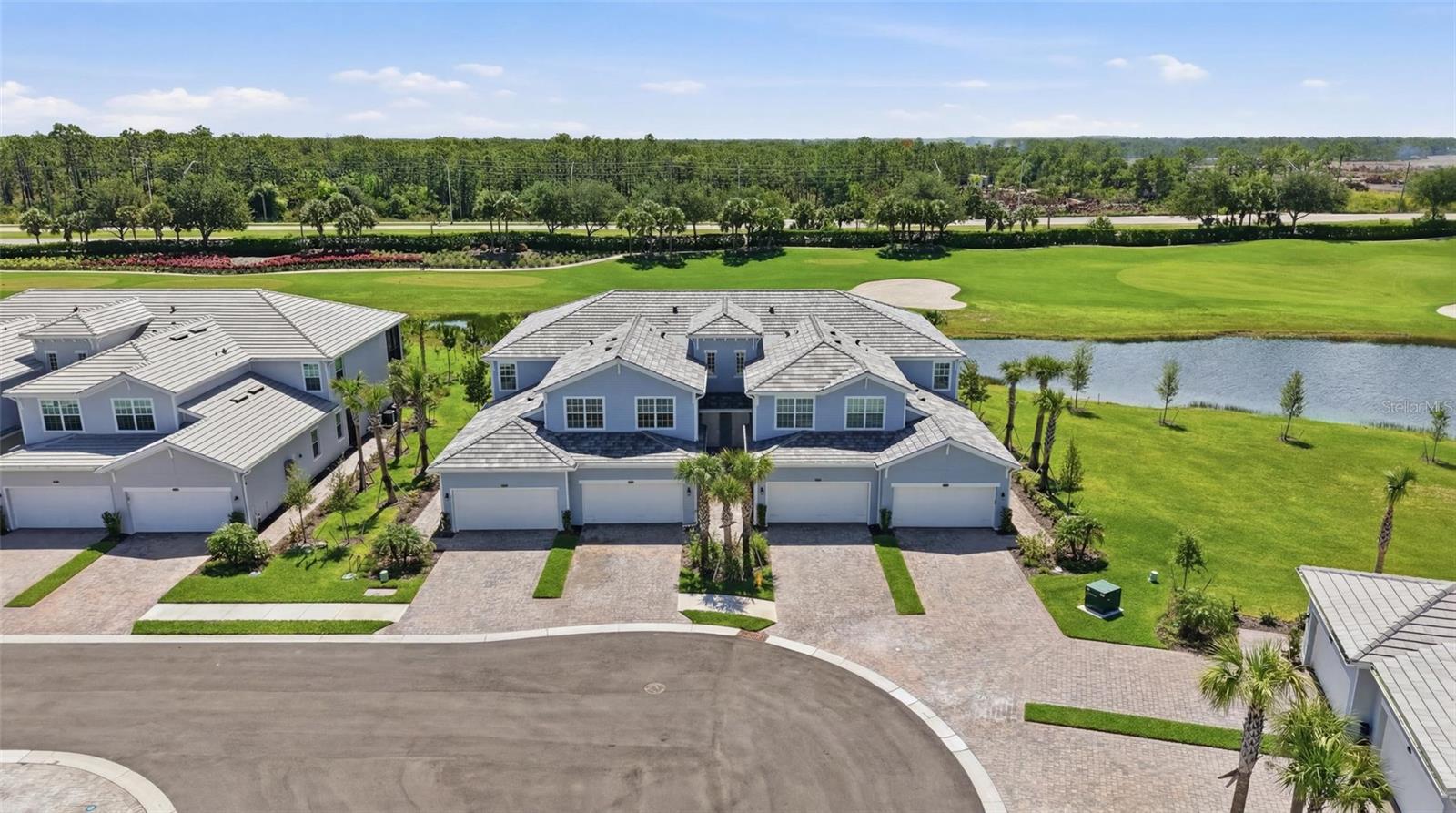 Welcome to this cul-de-sac location just outside the gates of Heritage Landing, while still enjoying all the exceptional amenities of this sought-after resort-style community. This upper-level coach home is perfectly positioned to capture beautiful golf course views from multiple vantage points. A social membership is included, with the added benefit of access to the community's premier golf course at discounted rates from May through October. The most stunning feature of this property is the COMPLETELY REMODELED KITCHEN AND ADDED BAR AREA providing an opportunity for entertaining or relaxing at home. 
The NEW KITCHEN features 
*High quality Quartz counters 
*All new full overlay wood cabinets with dovetail drawers and soft close features
*New granite single bowl sink and faucet with air switch for the disposal 
*Tiled backsplash
*Dimmable under and over cabinet lighting
*New appliances include a double oven with induction cooktop, microwave with pull out vent, fingerprint free French door fridge and dishwasher with stainless interior. 
Your friends will have kitchen envy for sure and you get to enjoy a dream kitchen. The added bar area is a great use of space providing lots of the same high-quality cabinetry for extra storage and a showcase for your favorite glassware and bar items. High end details continue throughout the home with added cabinetry in the laundry room and NEW upgraded Washer and Dryer. The primary on-suite bathroom features a towel warmer. All lights in the home are on dimmers, and all ceiling fans are remote controlled DC motor fans. Storage is unbelievable in this home with all bedrooms having walk in closets, and extra storage nooks like in the dining room and under the stairs. The garage is oversized, which is perfect for two cars and a golf cart or work bench. Hanging storage has also been added. This condo lives like a single-family home with the added peace of mind of Maintenance free living. Within this amazing resort community, you will enjoy Racket sports like pickleball and tennis, a 24/7 gym and saunas, a resort pool with lap lanes, beach entry and hot tub as well as 4 other pools in the community with grills and bathrooms. Dine onsite at either the Tiki Bar or Clubhouse Grill room. The activities director keeps the fun going with weekly activities and live music all year long! Punta Gorda is a hidden gem, with the best fishing, boating & fierce Pickleball competitions. Downtown enjoys Chef owned restaurants and boutique shops. Some of Florida's best Beaches are only 45 minutes away. More shopping in Sarasota, Fort Myers or Naples is only an hour away. Two airports make it easy to get your ticket to paradise.