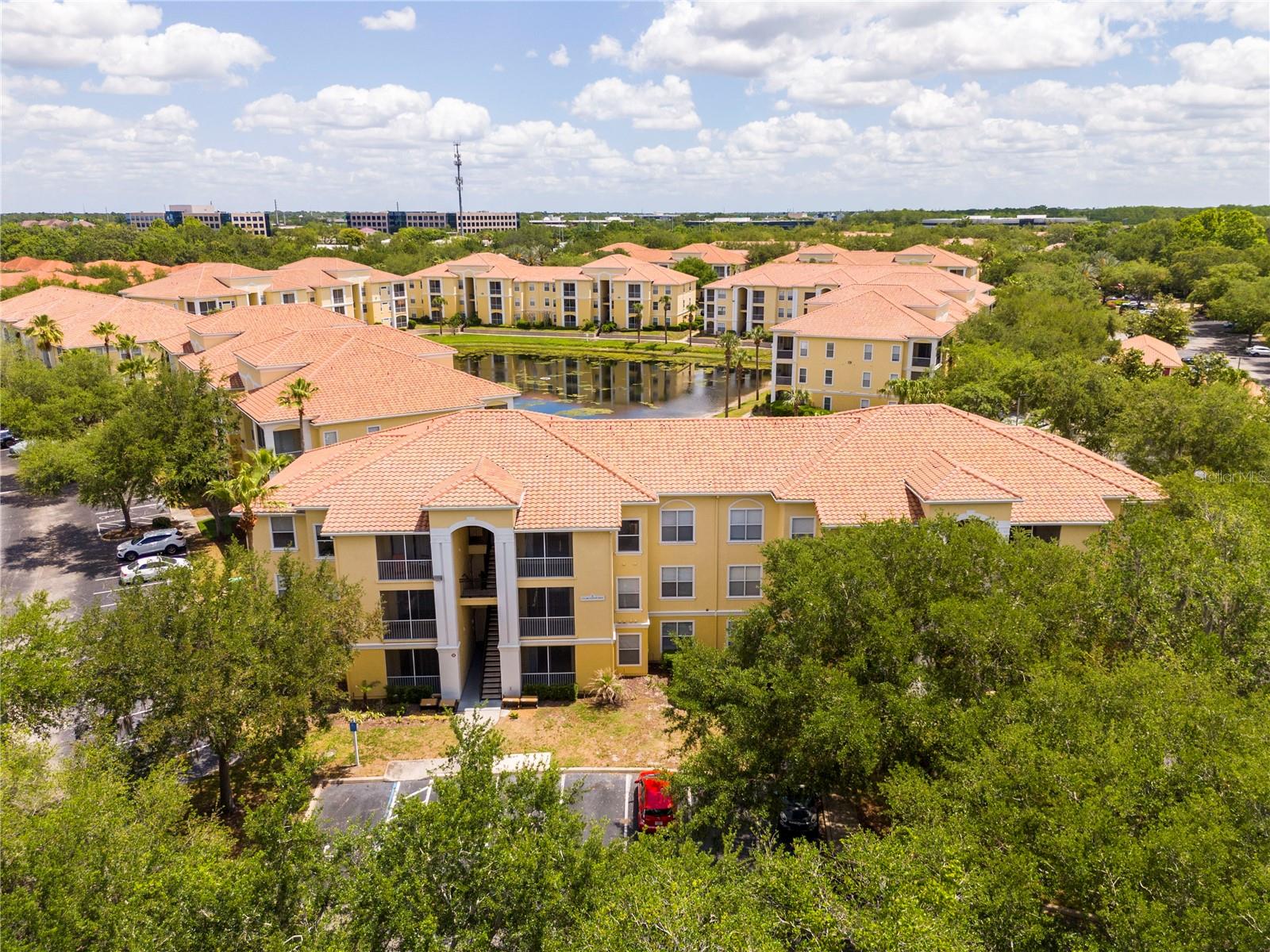 Stunning fully renovated 2-bedroom, 1-bath condo featuring a complete top-to-bottom remodel completed in 2026, located in the highly desirable gated Visconti West community in Maitland. This move-in ready unit features luxury vinyl plank flooring throughout, a beautifully updated kitchen with modern soft-close cabinetry, sleek finishes, and stainless steel appliances, as well as a bright open-concept living and dining area. The living and dining room combination opens to a screened-in patio through large sliding glass doors, allowing for abundant natural light throughout the home. The kitchen includes a full suite of brand-new appliances, including a range, over-the-range microwave, dishwasher, refrigerator, and disposal, along with modern soft-close cabinetry and ample countertop space. Additional upgrades include a new water heater (2026) and AC system (2020). The unit also features a full-size washer and dryer and an additional storage closet on the patio. Community amenities include a resort-style pool, fitness center, clubhouse, tennis courts, and lake access. Conveniently located near shopping, dining, major highways, and downtown Orlando. Excellent opportunity for owner-occupants or investors.