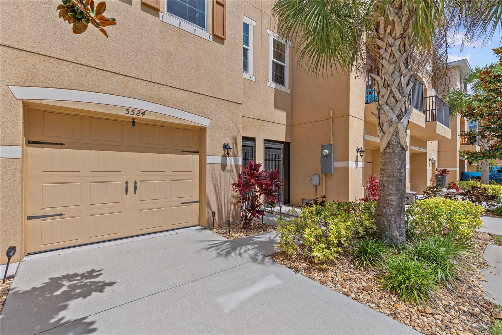 Exceptional Value Opportunity, Seller will pay HOA dues through the end of 2026! - Experience refined Florida living in this beautifully appointed 2-bedroom, 2.5-bath townhome with an oversized 1-car garage, located in the highly sought-after Sea Forest Beach Club community. Residents enjoy access to the exclusive Gulf Harbors Beach Club, featuring a private beach, pavilions, and grilling areas along the Gulf. Offering more than 2,300 total square feet, this thoughtfully designed home blends comfort, style, and convenience. Luxury vinyl flooring flows throughout the main living areas, while brand-new carpet adds comfort and a fresh, updated feel to the upstairs bedrooms. The chef-inspired kitchen showcases quartz countertops, soft-close cabinetry, stainless steel appliances, a pantry, and a breakfast bar perfect for casual dining or entertaining. Abundant storage is found throughout the home, including multiple closets and a rare, oversized storage room adjacent to the garage. The main living level provides a floorplan design ideal for entertaining, featuring a spacious living room, dining area, convenient half bath, and balcony. Step out onto the balcony overlooking your private, fenced backyard—the perfect spot to enjoy morning coffee or unwind after a long day. Down below, a charming screened porch opens to the brick-paver patio, creating an inviting outdoor retreat for relaxing or hosting guests. Upstairs, you'll find two generously sized bedrooms, each with its own private en-suite bathroom. The primary suite offers a peaceful sanctuary complete with a walk-in closet and a beautifully appointed bath designed for comfort and relaxation. Sea Forest Beach Club is a golf cart and pet-friendly, maintenance-free community featuring two pools (one heated and located adjacent to the fitness room) and a large dog park. There are no CDD fees, and the low HOA fee includes exterior maintenance, roof replacement, cable (including numerous streaming apps), internet, public water and sewer, and access to all community amenities. Conveniently located near Sims Park, vibrant downtown New Port Richey dining and entertainment, Gulf Coast beaches, and Tampa International Airport, this home offers the perfect combination of luxury, lifestyle, and location. Don't miss this exceptional opportunity to enjoy the Florida lifestyle you've been dreaming of!