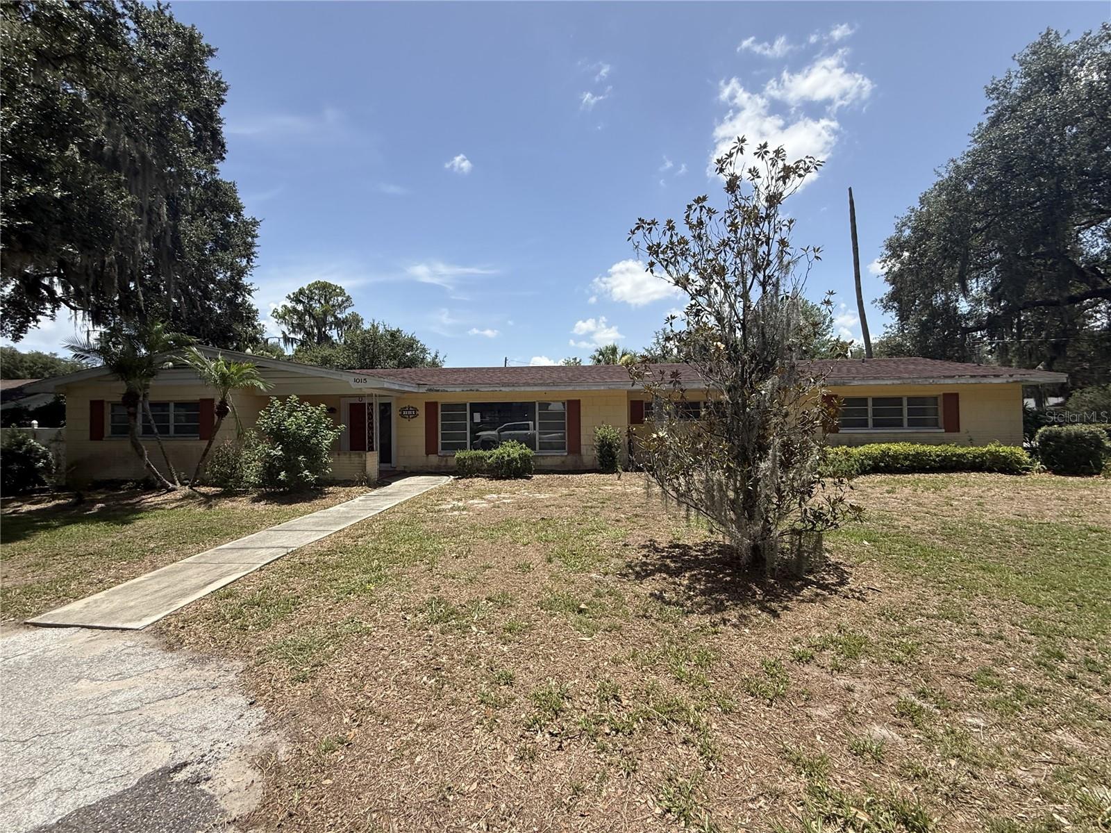 Great POOL home opportunity in Bartow with no HOA or CDD! Built in 1959, this unique home offers 4 bedrooms, 3 bathrooms, a 3-car garage, 2,932 square feet of living space, and sits on nearly a 1/2-acre lot with a screened lanai and in-ground pool. Step inside to a spacious living room that flows seamlessly into the dining room and kitchen. The kitchen offers ample cabinet and counter space along with views of the backyard oasis. Just off the kitchen is a generous family room with sliding glass doors leading to the covered patio, screened lanai, and pool area. Adjacent to the family room is an oversized 20x20 bonus room complete with a full bathroom, making it an ideal space for a guest suite, home office, game room, or additional living area. Between this space and one of the secondary bedrooms is a bonus room/closet offering exceptional storage or flexible use. The secondary bedrooms are located the opposite side of the home nearby and share a full bathroom. The private primary suite is situated here also and features its own full bathroom with a vanity and tub/shower combination. Great central location with easy access to I-75, shopping, dining, and everyday essentials. FHA financing is available (I-insured). FHA 203k loan eligible if buyer chooses, but is subject to buyers FHA appraisal. Buyer selects closing agent/firm. This home is owned by HUD - Housing of Urban Development. "All properties sold 'as is' without any guarantee or warranty by the seller". All buyers must be accompanied in by a representing RE agent. All measurements are estimates. 15-day owner occupant first look period.