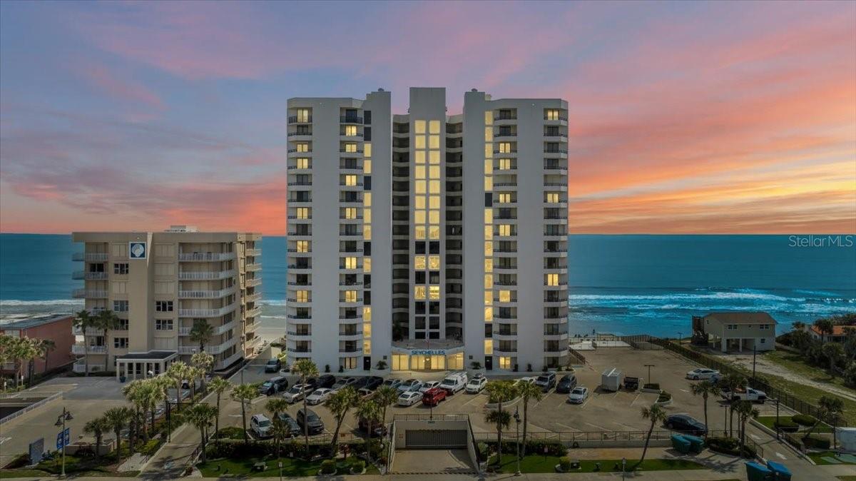 Experience luxury oceanfront living in this fully renovated penthouse condo at Seychelles in Daytona Beach Shores, FL, offering direct oceanfront southeast exposure with uninterrupted panoramic views of the Atlantic Ocean. This beautifully updated residence features modern coastal finishes, including porcelain plank tile flooring throughout, newly installed hurricane-impact windows with storm shutters, and a spacious layout designed for comfort and style. Enjoy the convenience of an in-unit laundry room, two generous bedrooms, and two beautifully updated bathrooms, all enhanced by abundant natural light and breathtaking views. The condo is move-in ready, and the furniture is negotiable, allowing you to tailor the space to your personal preferences—whether you want a turnkey beach retreat or plan to bring your own coastal aesthetic.

Ideal for full-time living, a seasonal getaway, or investment, Seychelles offers a pet-friendly environment allowing two small pets up to 20 pounds and a flexible two-week minimum rental policy that provides excellent short-term rental potential. With direct beach access and close proximity to restaurants, shopping, golf, and entertainment, this penthouse delivers the best of Daytona Beach Shores' resort-style lifestyle. Don't miss this rare opportunity to own a premier oceanfront propertyschedule your private showing today and experience refined coastal living at Seychelles.