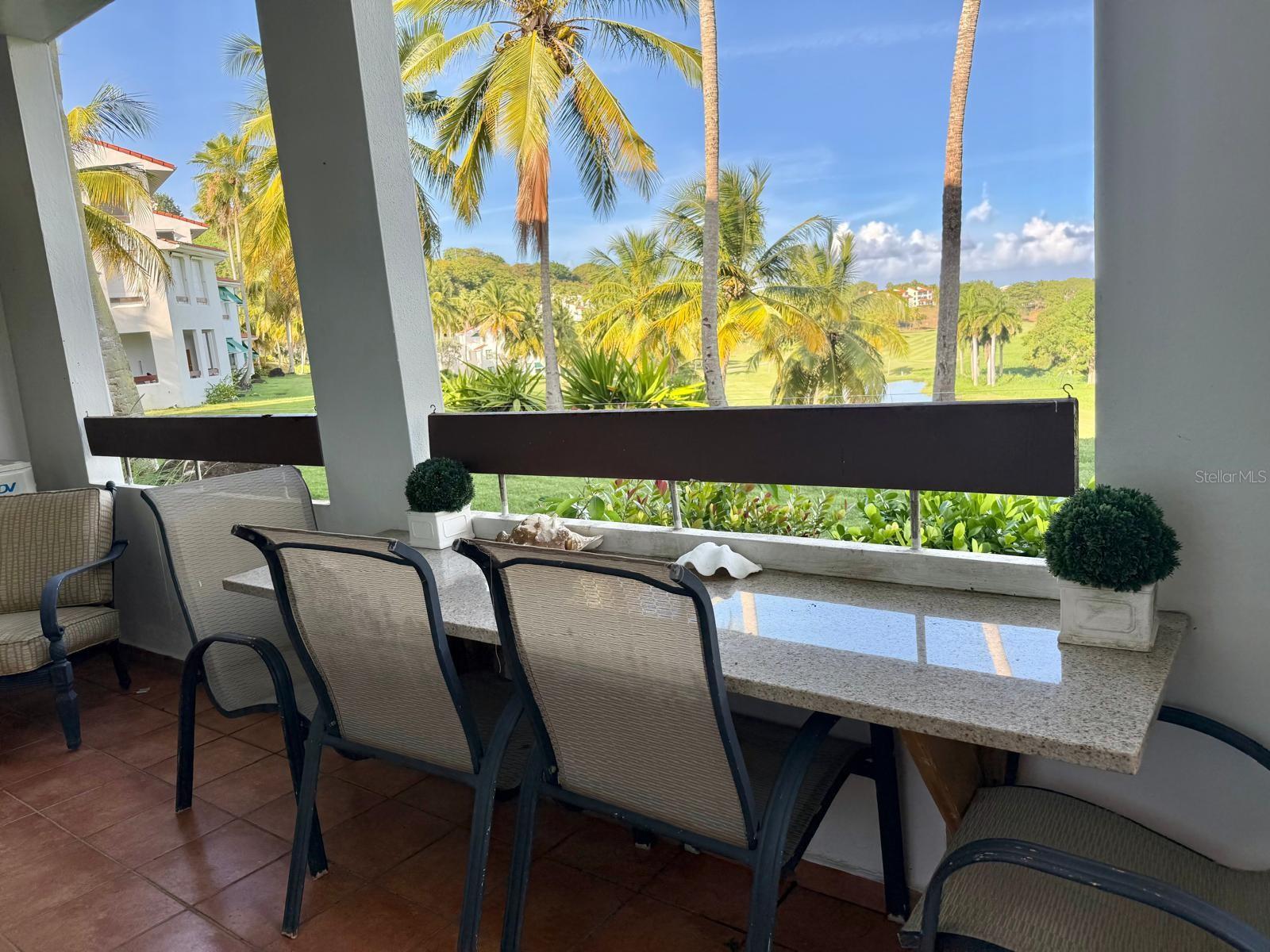 Price  reduced! Great villa fully furnished and equipped, located at the Rio Mar Village area at the luxury resort Wyndham Rio Mar Beach Resort in Rio Grande. The villa has 3 bedrooms and 3.5 bathrooms, has a balcony with an amazing open view to the golf course and the National Rainforest El Yunque. It is located on the first floor, easy steps to get in. Great clubhouse with playground. It has 3 parking spaces assigned. Rio Mar Village provide areas  for golf carts. Unit is in top conditions to move in. Call today for more information to schedule an appointment. This is a great unit with cross ventilation and views. Very relaxing and private.
