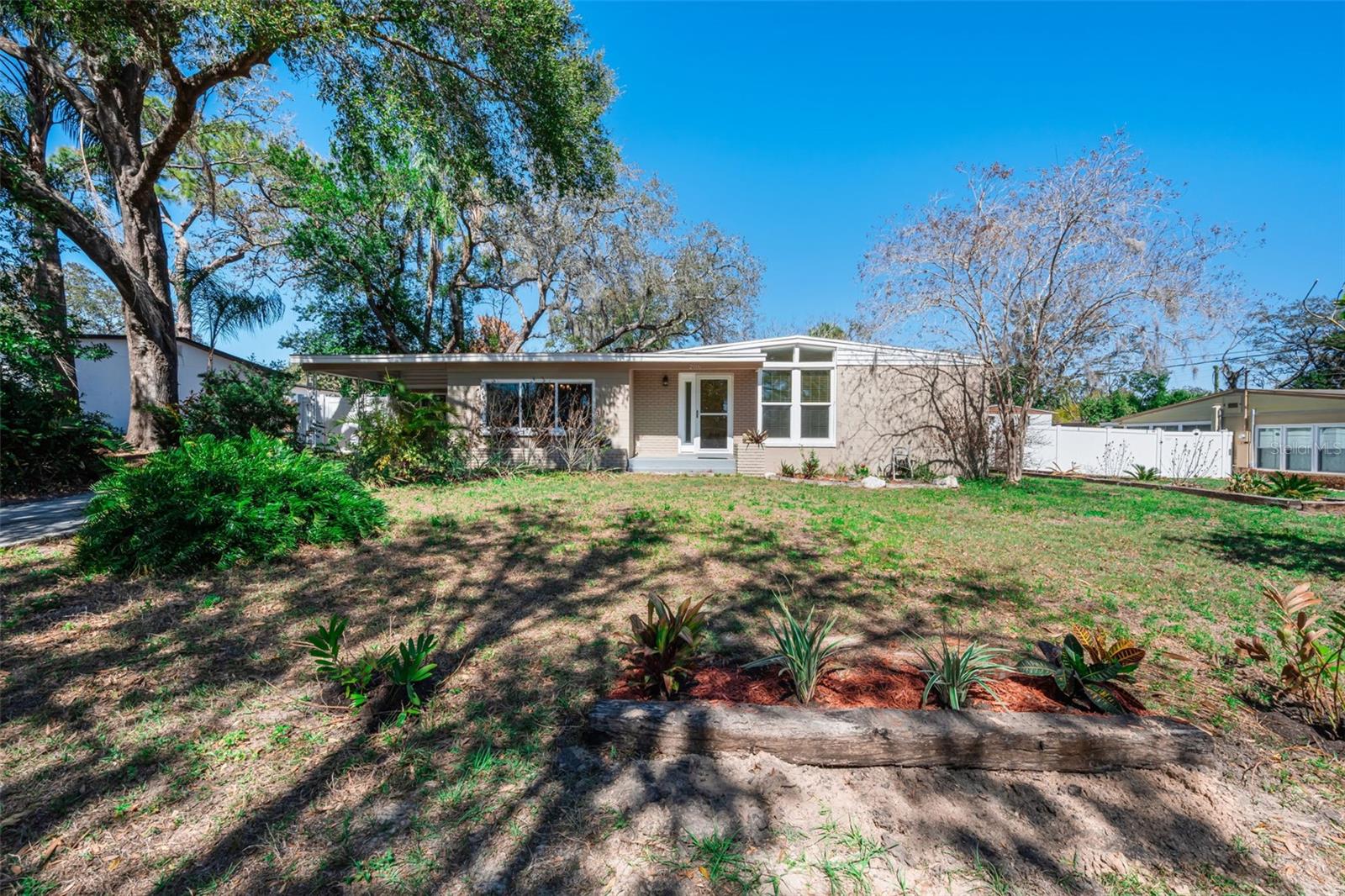 Welcome home to this updated 3-bedroom, 2-bath home in the highly sought-after Temple Terrace Heights neighborhood, offering a perfect blend of charm, updates, and convenience. This established community is known for its mature landscaping, spacious lots, and central location. Situated just minutes away from Tampa, Seminole Heights, and much more! As you enter, you’re welcomed by a spacious open living and family room area filled with natural light from the abundance of windows throughout the home. Hardwood flooring runs throughout the main living areas and bedrooms, while the kitchen, dining room, and bathrooms feature brand new tile flooring.The kitchen shines with granite countertops, crisp white cabinetry, and an open design that flows seamlessly into the dining room—ideal for entertaining and everyday living. Major updates provide peace of mind, including a newer roof (2018), AC system (2018), 
plumbing (2018), electrical (2018), and impact-resistant windows throughout the home. Step outside to enjoy the very large, fully fenced backyard—perfect for pets, gatherings, or future possibilities. With inviting curb appeal, quality upgrades, and an unbeatable location, this move-in ready home is one you don’t want to miss. Conveniently located just minutes from Busch Gardens, USF, and Interstates 275, I-4, and 75, offering easy access throughout the Tampa Bay Area, shopping, dining, and entertainment. Schedule your tour today!