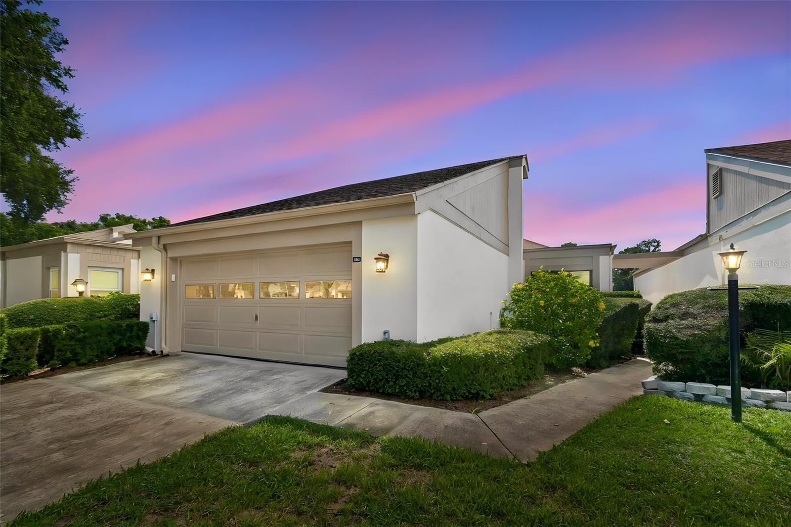Escape the winter chill in this fully furnished, turn-key Florida retreat on the greens of Ardea Country Club! Located in the premier gated community of East Lake Woodlands in Oldsmar, this charming home features a stunning view of the 17th hole directly from your private sunroom. Pack your bags and leave the snow shovel behind—everything you need is already here, from stylish furniture to essential housewares. Bring your four-legged family members along, as the community is pet-friendly, allowing up to two dogs or cats. The property includes a spacious two-car garage, perfect for secure vehicle and golf cart storage while you are away. Enjoy resort-style, low-maintenance living just minutes from pristine beaches, premier racquet facilities, and vibrant local dining. This is your ultimate hassle-free seasonal getaway or permanent paradise!. Fully Furnished: Move-in ready with all furniture and housewares included. Golf Course View: Front-row seats to the 17th hole from the bright sun oom. Your new living gives you access to two championship 18-hole courses, tennis, pickleball, and pools via optional membership. Pet-Friendly: Welcome home to your furry companions (up to two dogs or cats allowed). Low Maintenance: Perfect lock-and-leave property for seasonal residents.
