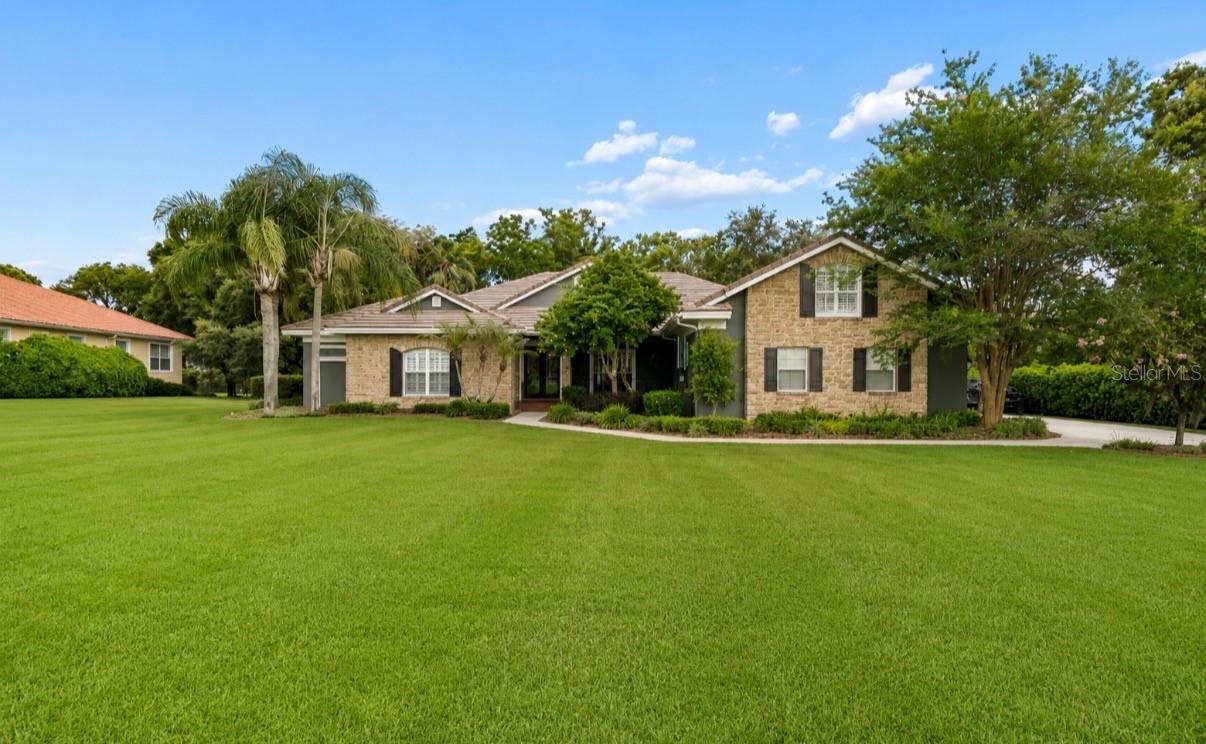 Experience refined Florida living in this beautifully updated 6-bedroom, 4-bath estate with a 3-car garage, ideally situated on a private 3/4-acre homesite on the 10th hole of the South Course in the exclusive Estates of Lake Jovita.

From the moment you arrive, you’ll appreciate the home’s timeless curb appeal, welcoming entrance, bright and open interior filled with natural light, soaring tray ceiling, and a thoughtfully designed split floor plan that perfectly balances elegance, comfort, and privacy.

At the heart of the home, the gourmet chef’s kitchen showcases stunning leathered granite countertops, new Thermador stainless steel appliances and abundant custom cabinetry and a spacious dinette area surrounding by windows overlooking the pool.  The custom walk-in pantry has storage galore with cabinets, butcherblock countertop and shelving to the ceiling. Everything flows effortlessly into the expansive family room and custom library, highlighted by custom built-in shelving, creating an exceptional space for both everyday living and effortless entertaining.

The home also features elegant formal living and dining rooms, along with a private executive office or den. Rich wood finishes throughout add warmth, sophistication, and timeless character.

The luxurious primary suite serves as a private retreat with a spa-inspired bath featuring a soaking garden tub, walk-in shower, dual vanities, and an oversized walk-in closet. There is an additional closet separate from the walk-in closet, that is perfect for that shoe and/or purse collection.

Upstairs, a spacious private bonus suite with a full bath offers incredible flexibility as a sixth bedroom, guest retreat, executive office or nanny quarters.

The generously sized secondary bedrooms each offer ample closet space and convenient access to multiple full bathrooms, making the layout ideal for everyone, multigenerational living, or hosting guests. 

Step outside to your own backyard oasis featuring a screened paver lanai, sparkling pool, expansive entertaining areas, and a cozy fire pit surrounded by mature landscaping that provides exceptional privacy and a peaceful setting for relaxing or gathering.

The interior and exterior paint have been updated. The engineered hardwood floors throughout are only four years old. One of the three AC’s were replaced in late 2024, one is 2025 and the main AC was replaced this year. The lightweight concrete tile roof was recertified in 2025. The pool screen enclosure was replaced three years ago with heavy duty golf ball resistant screen. This smart home includes whole house audio with Wi-Fi boosters throughout. 

Experience the rolling hills and natural elevation changes that make Lake Jovita feel more like the mountains of North Carolina than Central Florida. Just 20 minutes north of Tampa, and approximately one hour from Orlando, world-renowned beaches, and major attractions, this extraordinary community is truly one of Florida’s hidden gems. Residents enjoy an optional country club lifestyle with two golf courses, while being just minutes from I-75, top-rated hospitals, shopping, dining, excellent school, and the charm of historic downtown Dade City.

This exceptional estate offers the perfect blend of luxury, privacy, and timeless elegance in one of Central Florida’s most desirable gated golf communities. Don’t miss this rare opportunity to own a truly remarkable home.
