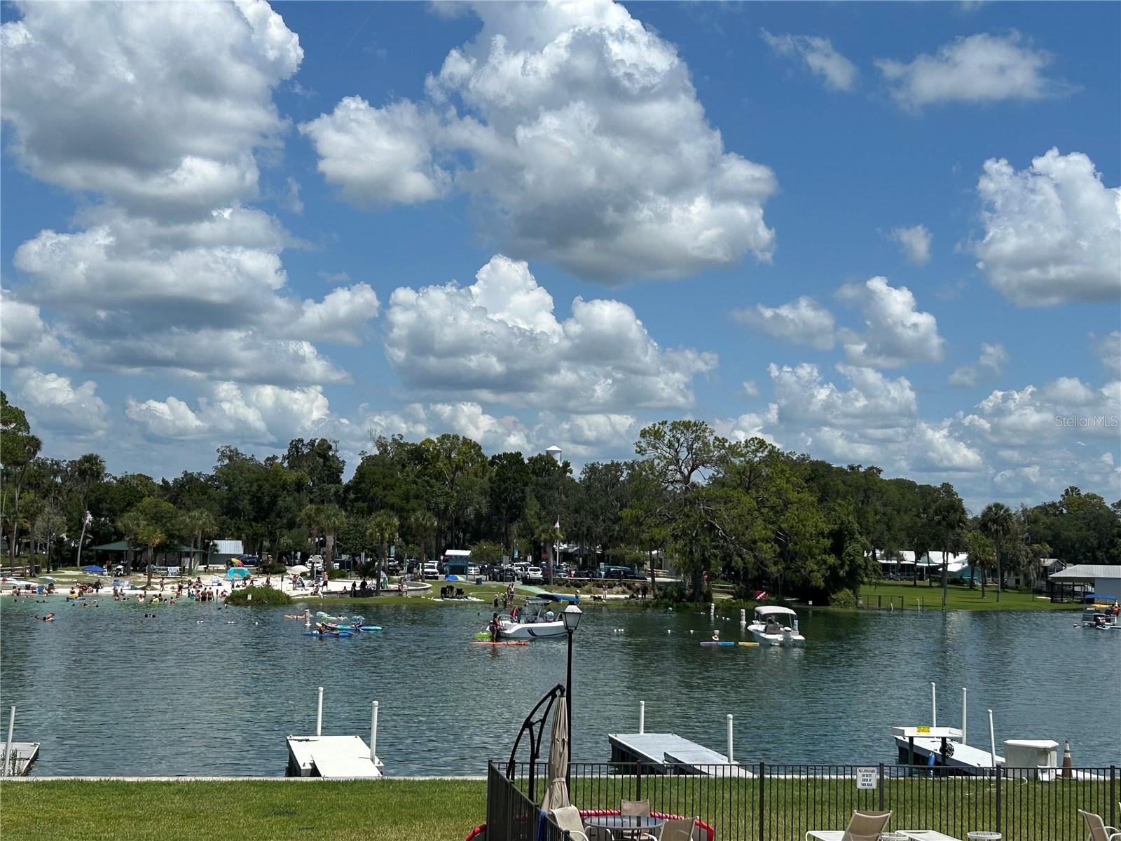 Enjoy the best of Florida waterfront living in this beautifully renovated 2-bedroom, 2-bath 2nd floor condo in the heart of Crystal River. Fully updated in 2022, this move-in-ready, turnkey unit comes completely furnished and stocked-perfect as a full-time residence, vacation getaway, or income-producing rental. Step into a bright, open living space with durable tile flooring and a modern kitchen featuring granite countertops. Sliding glass doors fill the home with natural light and lead to your private balcony, where you'll enjoy peaceful views of the community pool and Crystal River Beach. For fishing and boating enthusiasts, the property includes ownership of a private floating dock, allowing easy access to the Gulf. This is a second floor unit, so it has never flooded! Known for its natural beauty, Crystal River offers incredible opportunities for fishing, boating, and even spotting gentle manatees!
