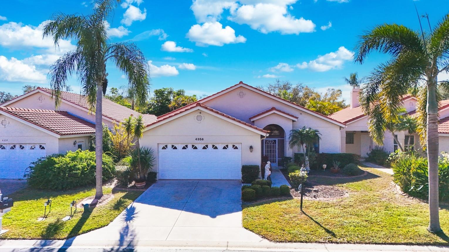 Welcome home! 4356 Marcott Cir is ready for its new owners! Located in the heart of sunny Sarasota, FL, this SOUTH FACING, POOL home truly has it all! Offering 2,011 SQFT, this 3 bed, 2 bath, 2 car garage residence is the perfect FL getaway. This OPEN CONCEPT floor plan makes entertaining a breeze. The chef of the family will appreciate the SPACIOUS KITCHEN with STAINLESS STEEL APPLIANCES. Bright, open living and dining areas connect seamlessly to the screened pool and lanai—perfect for enjoying Florida living and avoiding those frigid Northern winters! The welcoming front entry features DOUBLE FRONT DOORS with a SCREENED-IN FRONT ENTRY. The primary suite is over sized, making it the perfect oasis, with direct access to the lanai and pool from both the bedroom and bathroom for added convenience. The second guest bedroom is welcoming and comfortable for visitors, while the third bedroom can easily be used as a den, thanks to the glass French doors.

The spacious lanai and POOL have recently been redone for peace of mind. Additionally, the TILE ROOF was replaced in 2017. Pride of homeownership is evident throughout this well-maintained home, highlighted by homeowner-added CUSTOM, HAND MADE STAINED GLASS in the living room that enhances natural light while adding a unique architectural touch. As an added feature, the home has the option to be sold FURNISHED under a separate bill of sale. Seville at Center Gate is a quaint community with LOW HOA dues, which INCLUDE LAWN CARE ASSISTANCE, and NO CDD fees. The location is truly exceptional—just minutes from I75, University Town Center (UTC), multiple GOLF COURSES, SIESTA KEY BEACH, downtown Sarasota, and fantastic HEALTHCARE options, including the main campus of Sarasota Memorial Hospital. A wonderful opportunity to enjoy comfort, flexibility, and a central Sarasota lifestyle. Please check out the 3D tour uploaded! Call today to see your new home!