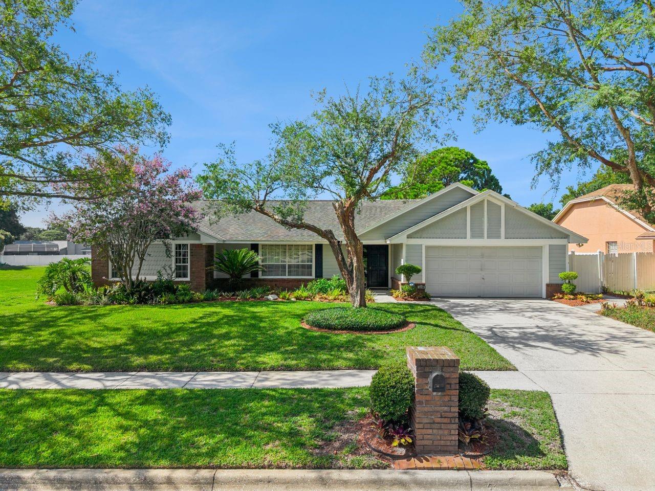 Welcome to 1129 Climbing Rose Drive—a move-in-ready, beautifully maintained pool home offering privacy, comfortable living, and convenient access to everything Central Florida provides.

Located within the City of Ocoee while retaining an Orlando mailing address, this inviting residence features three bedrooms, two bathrooms, and a thoughtfully designed layout. A traditional wood-burning fireplace creates a warm and welcoming focal point for relaxing evenings and everyday gatherings.

Step outside to your private Florida retreat, complete with an enclosed swimming pool and spa, a spacious covered lanai, and a beautifully paved garden area surrounded by mature landscaping. With no direct neighbors along one side or behind the property, the outdoor space provides an added sense of peace, privacy, and seclusion.

Additional highlights include a roof replaced in 2018, a well-maintained neighborhood, and affordable HOA fees. Convenient access to State Road 408 and Florida’s Turnpike makes commuting to Downtown Orlando, shopping, dining, entertainment, and major employment centers simple.

Well cared for and ready for its next owner, this home combines privacy, inviting outdoor living, and everyday convenience in one attractive package.