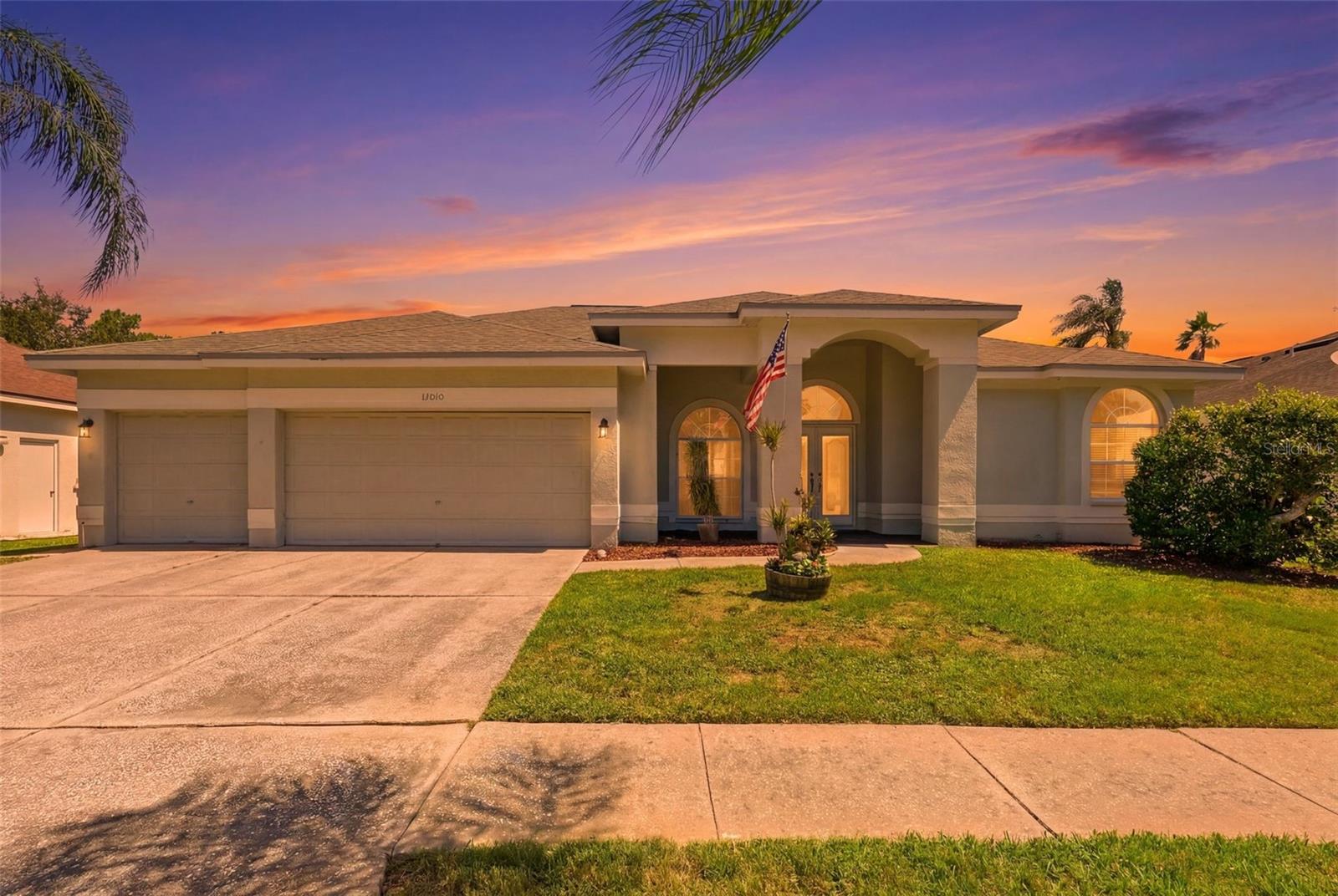 Welcome to your next home, within the sought-after Clubhouse Estates of Summerfield, this spacious four-bedroom, three-bath pool home offers the ideal combination of comfort, functionality and Florida lifestyle where breathtaking, unobstructed golf course and lake views create an unforgettable backdrop to everyday living. Designed to maximize the incredible scenery, the home features walls of sliding glass doors that flood the interior with natural light and provide seamless indoor and outdoor living from multiple rooms. Go outside to your private screened lanai, where a heated pool and spa invite you to relax while overlooking the peaceful water and manicured fairways. Whether enjoying your morning coffee, hosting family gatherings or winding down at sunset, this backyard oasis is one of the home's standout features. A new 2026 pool pump adds peace of mind for the new owner. Inside, you'll find a well-designed split-bedroom floor plan with generous living spaces, ideal for everyday living and entertaining. The oversized three-car garage provides ample room for vehicles, storage, hobbies or a workshop. Living in Clubhouse Estates means enjoying an exceptional lifestyle with access to an impressive collection of community amenities, including multiple swimming pools, a fitness center, tennis courts, pickleball courts, basketball courts, playgrounds, recreational trails, dog parks and beautiful Summerfield Crossings Golf Club. Residents also appreciate the community's low HOA and absence of CDD fees. Convenience is another major advantage of this location. Just minutes from Interstate 75, you'll have quick access to downtown Tampa, world-renowned Gulf Coast beaches and everyday essentials. Countless restaurants, grocery stores, shopping centers, medical offices and a nearby hospital are all within a short drive, making this an ideal location for families, professionals, and anyone seeking convenience and an active Florida lifestyle. If you've been searching for a home that combines spectacular views, outstanding community amenities, and an unbeatable location, this home is ready to exceed your expectations. Schedule a private tour today!