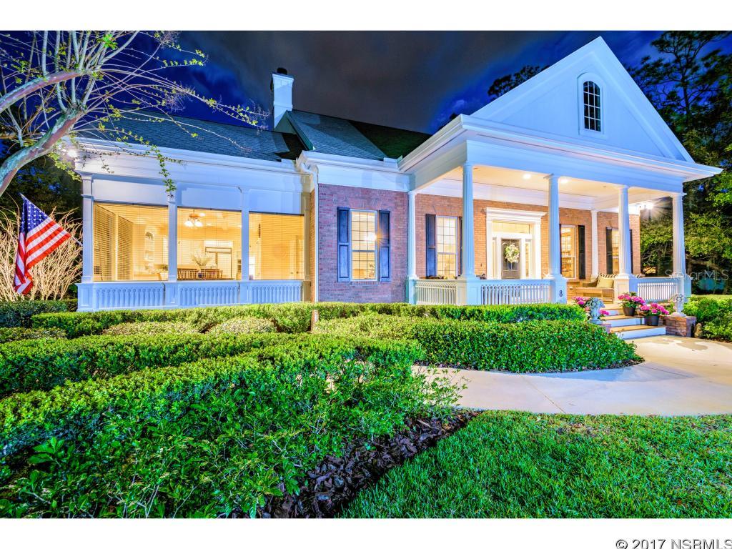 Stunning Southern Style Home that looks like it came right out of a design magazine.  Fabulous Front porch with stately columns. Meticulously designed, beautifully decorated and located in Broadwater, one of Ormond Beach's most exclusive and desired neighborhoods.  This home is full of unexpected and delightful surprises at every turn.  Quality all brick custom built spacious home with plenty of room for the entire family and great storage.  Gleaming hardwood floors, 2 fireplaces, custom millwork and built-ins.  A gorgeous light filled chef's kitchen with Bianco Romano Granite, high-end appliances, center island.  The Master Suite features a sitting area and luxurious Master Bath with claw footed tub that sits beneath a beautiful arched window.  His and Hers walk-in closets, and separate vanities, separate shower.  There is a separate staircase for the Bonus Room that could be a 5th bedroom if needed.  Unfinished attic space was designed for future expansion and additional living space if needed.  A short drive to the beach, parks, golf courses, great shopping and fine dining. ;Water: City