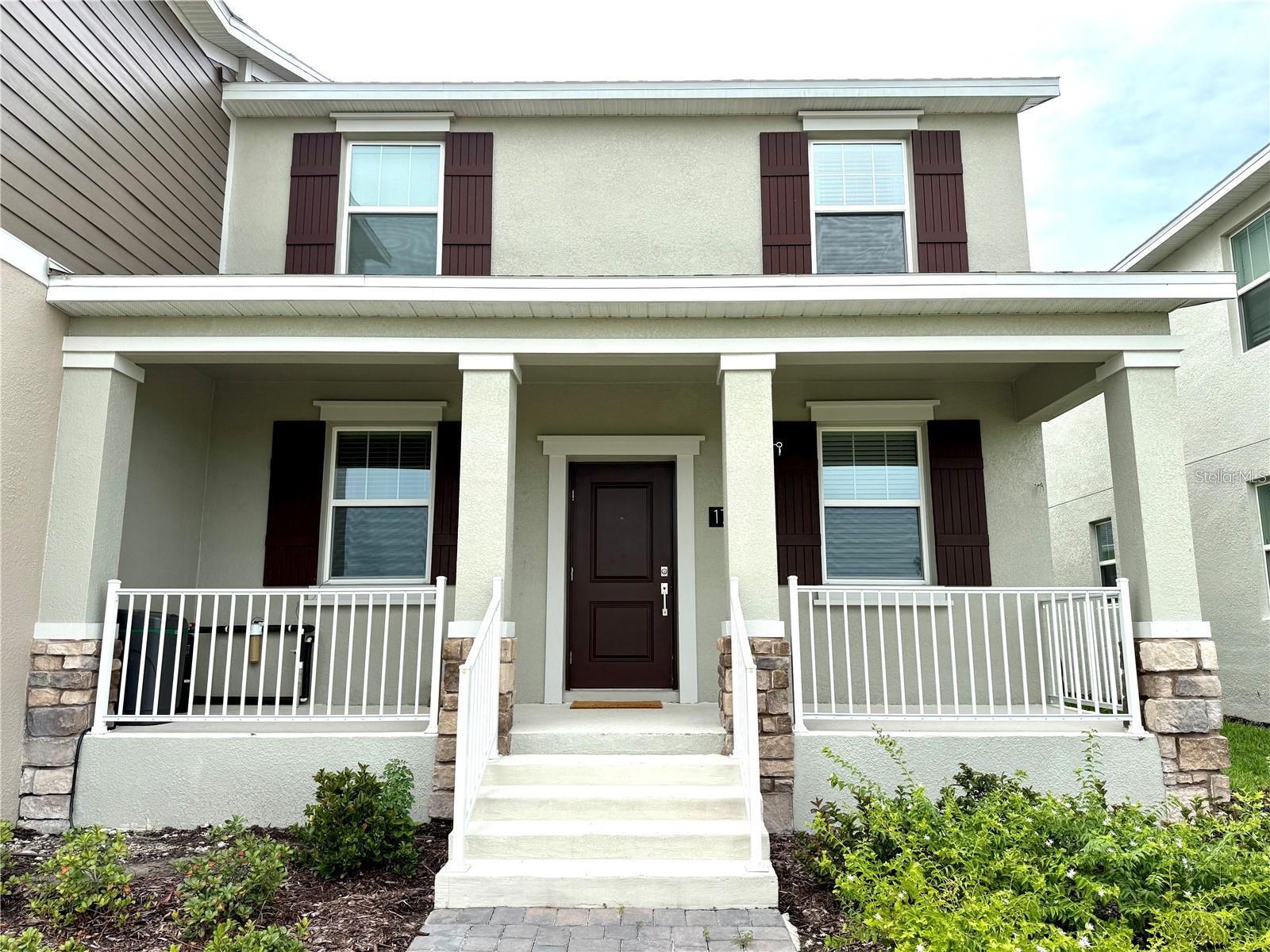 Welcome to this beautifully designed Lancaster model townhome located in the highly sought-after Tohoqua community in Kissimmee. This bright and spacious two-story residence offers 3 bedrooms, 2.5 bathrooms, and a convenient rear-load 2-car garage, blending modern comfort with functional living. The open-concept floor plan features a spacious living and dining area that flows seamlessly into the stylish kitchen, complete with quartz countertops, stainless steel appliances, ample cabinetry, and generous counter space—perfect for everyday living and entertaining. A dedicated laundry room with washer and dryer is included for added convenience. Upstairs, the private owner's suite offers a relaxing retreat with a walk-in closet and en-suite bathroom. Two additional bedrooms and a full bathroom provide plenty of space for family, guests, or a home office. This move-in-ready home comes fully equipped with blinds, all appliances, and smart home technology, including a video doorbell and keyless entry system. Residents of Tohoqua enjoy exceptional resort-style amenities, including a community pool, clubhouse with fitness center, tennis and pickleball courts, playgrounds, and scenic walking trails. Conveniently located near major highways, shopping, dining, schools, and Central Florida attractions, this home offers the perfect combination of style, comfort, and location. Don't miss the opportunity to own a beautiful home in one of Kissimmee's most desirable master-planned communities.
