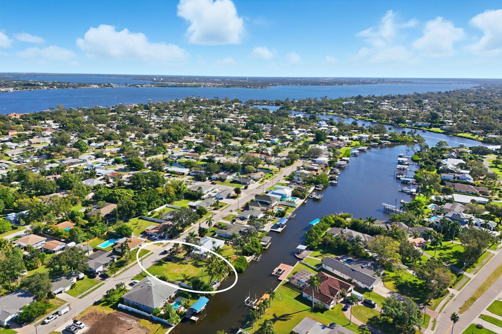 This exceptional waterfront property is located in one of the most desirable areas of Northwest Bradenton on tranquil Warner’s West Bayou. Offering approximately a quarter acre of land with about 86 feet of direct frontage on the bayou, this beautiful lot provides an ideal setting for building a custom home that takes full advantage of its peaceful water views and natural surroundings. From this location you can enjoy easy boating access to the Manatee River and continue on to the Gulf, making it perfect for anyone who loves life on the water.



The lot is open, sunny, and framed by tall mature palms that create a relaxing vacation-like atmosphere year-round. There is ample space to design a residence with generous outdoor living areas, a pool, and a private dock, while still preserving a sense of privacy and serenity. Whether you envision a contemporary coastal retreat or a timeless Florida-style home, the setting allows endless possibilities for maximizing views, breezes, and connection to the water.



This part of Northwest Bradenton is known for its combination of beauty and convenience. The property sits just moments from Robinson Preserve, where miles of scenic walking trails, kayaking routes, and wildlife viewing areas showcase the best of Florida’s natural landscape. Nearby De Soto National Memorial offers more walkable shoreline and historic charm. Despite the tranquil residential feel, you are only a short drive from shopping, dining, and everyday conveniences.



For beach lovers, the world-famous shores of Anna Maria Island are just a few miles away, providing easy access to sugar-sand beaches, turquoise water, and charming island lifestyle. Sunsets, boating, paddleboarding, and waterfront dining are all close at hand, making this property a wonderful match for anyone seeking a relaxed coastal way of life.



This is a rare opportunity to secure a prime piece of waterfront land in a beloved Bradenton neighborhood, where properties of this kind are seldom available. It is the perfect location to create a home that reflects your vision, surrounded by nature, yet close to everything that makes this area so special. Here you can truly build the life you have always dreamed of, in a setting that offers beauty, privacy, and direct access to Florida’s remarkable waterways.