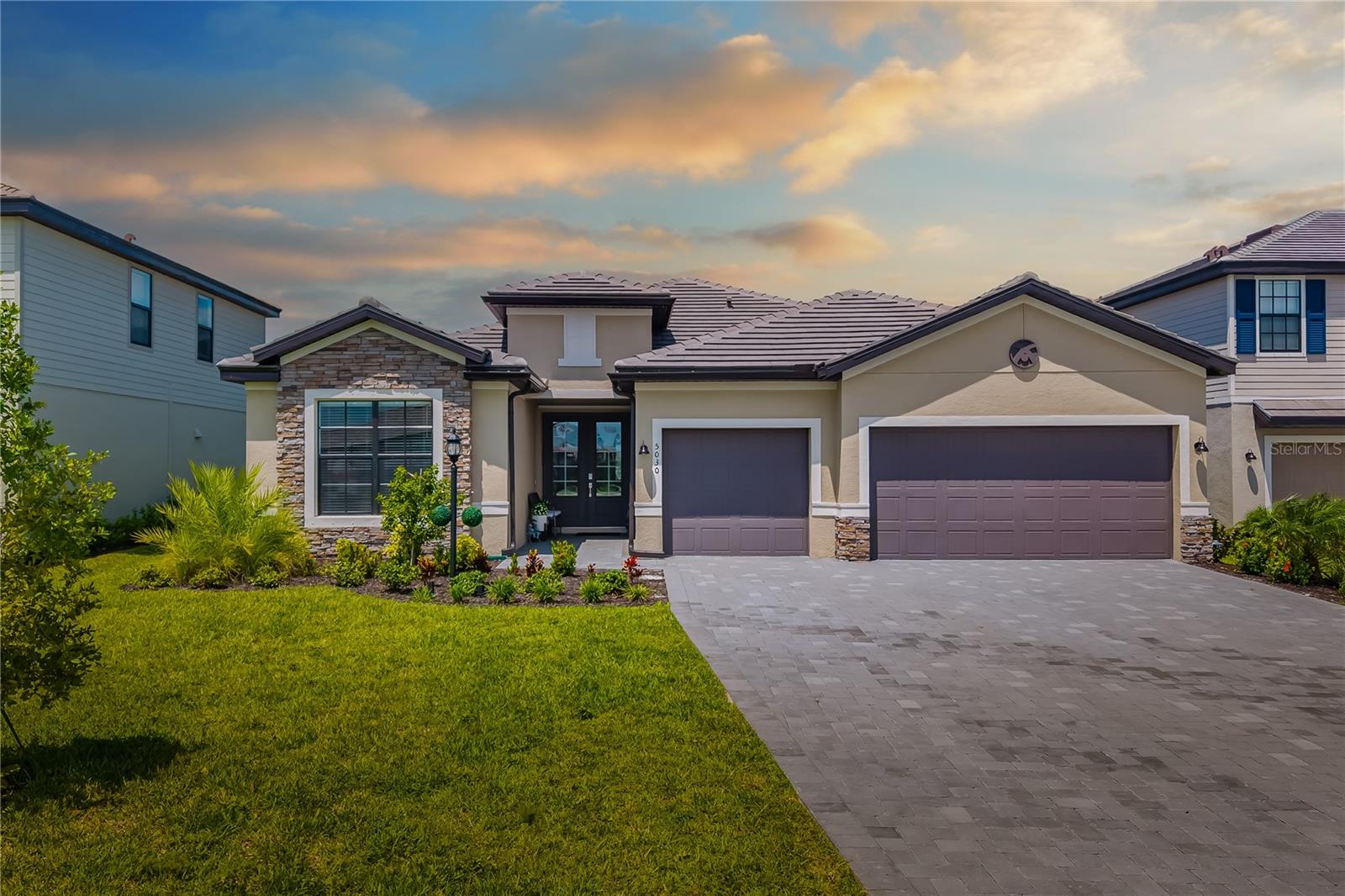 Welcome to this stunning Summerville model in the heart of the sought-after Lorraine Lakes community! This spacious 3-bedroom, 3-bath home also features a dedicated office, perfect for working from home or creating your own hobby space. Designed for both everyday living and entertaining, the open-concept layout flows seamlessly to the private screened pool area, where you’ll enjoy serene views with no neighbors behind you.

The chef’s kitchen offers abundant counter space, premium finishes, and a functional layout ideal for hosting. A 3-car garage provides ample storage for vehicles, tools, and toys. Located in a resort-style community, you’ll have access to incredible amenities including a clubhouse, fitness center, pool, sports courts, and restaurant .

This is more than builder-ready it’s fully upgraded and move-in ready, offering comfort, style, and privacy in one of Lakewood Ranch’s most desirable neighborhoods. This model no longer available with builder.