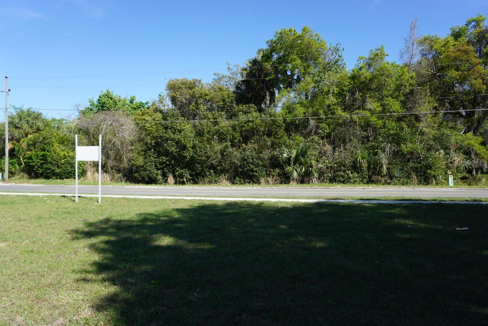 Spacious mixed-use commercial lot in a prime Eustis location offered as 1 of 3 adjacent parcels available for purchase. This 0.66-acre parcel offers excellent visibility, flexible mixed commercial use, and convenient access to major corridors, established businesses, and Downtown Eustis. Perfect for investors, business owners, or long-term strategic holding, this lot can stand alone or be assembled with the adjacent 0.19-acre and 1.16-acre parcels for expanded development potential. Utilities are available, and there are no HOA restrictions. Buyers are encouraged to confirm all permitted uses, density, and development options with the City of Eustis. A rare opportunity to secure a larger footprint in a thriving commercial corridor.