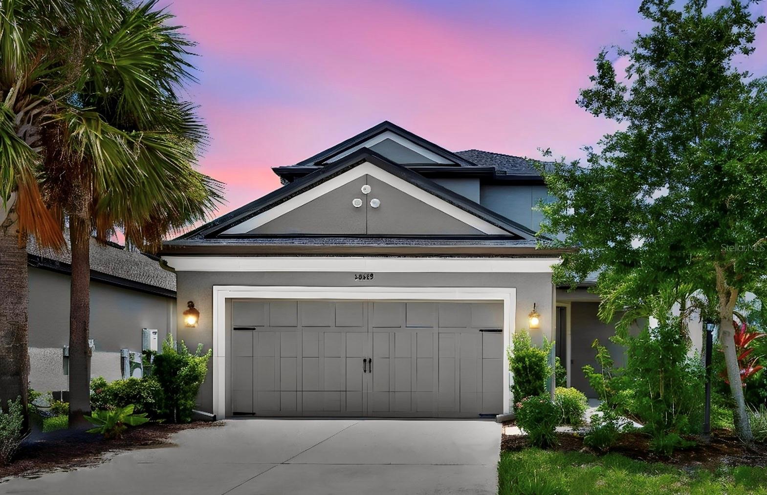 Welcome to Park East at Azario, where this beautifully maintained 4-bedroom, 3.5-bath Taylor Morrison home offers peaceful water views, flexible living space, and the relaxed Lakewood Ranch lifestyle. From the moment you step inside, you are welcomed by bright neutral finishes, wood-look tile flooring throughout the main living areas, and an impressive original two-story living room that creates a light-filled, open, and airy feel. The open-concept layout connects the kitchen, dining, and living areas with ease, while the spacious kitchen features stainless steel appliances, a gas range, generous cabinetry, and a large island for casual dining and entertaining.

A first-floor office provides a convenient space for working from home, studying, or everyday organization, while the upstairs loft space offers additional room for a media area, playroom, homework station, or reading nook. Step outside to the screened lanai and enjoy a peaceful water view, perfect for morning coffee, relaxing evenings, and peaceful Florida views. Move-in ready and thoughtfully designed, this home offers a wonderful combination of architectural appeal, desirable water-view lot placement, flexible living space, and exceptional value. Enjoy the benefits of a newer home without the wait for new construction, all in desirable Park East at Azario with convenient access to Lakewood Ranch amenities, shopping, dining, parks, schools, and everyday conveniences.