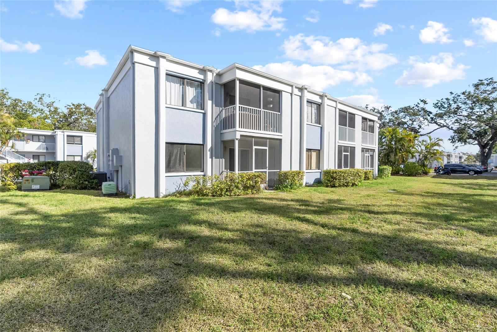 Motivated seller. Welcome to your completely remodeled second-floor 1B and 1B retreat! This move-in ready unit boasts an open and airy feel with elegant, easy-to-maintain tile flooring throughout the condo. All new appliances, and the ultimate convenience of a stackable washer/dryer. .  Recent upgrades ensure year-round comfort, including a new A/C system (installed Sept 2024) and a new sliding door.you're under 7 miles from Bradenton Beach, Downtown, SRQ Airport, and the shops & restaurants on renowned Bridge Street. Two golf courses are just a 10-minute drive away. Enjoy the community pool, gym, barbecue grills, and picnic areas. Assigned parking and easy bus access (#99 across the street) make life simple to airport.