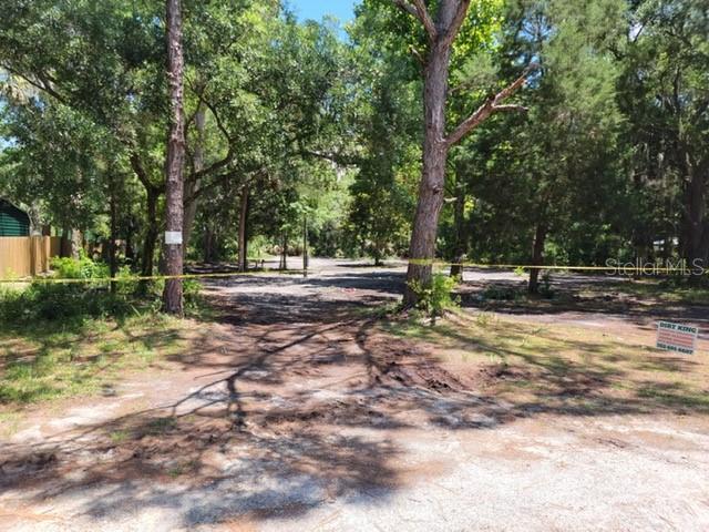 Looking for a quiet, large, READILY AVAILABLE LOT to build your personal canvas of a home? This lot comes FULLY CLEARED, WITH CITY WATER, POWER AND SEPTIC ALREADY INSTALLED and is ready for you to build your dream home. HIGH AND DRY! This 1+ ACRE lot is located in an area that offers easy access to shopping, main roads and has great schools. CASONS INGLIS ACRES is a very welcoming and mature neighborhood with access to several different boat ramps just a few miles away. Biking and nature trails, equestrian trails, and also very close to the Withlacoochee River which leads right into the Bay. Perfect Oasis to complete your dream Florida home! Contact your realtor today for more details!