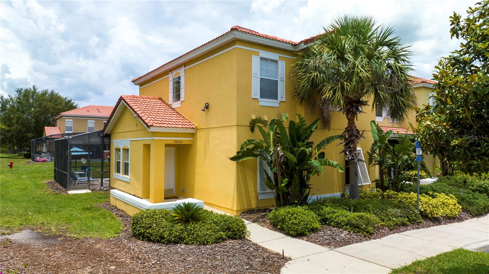 Welcome to 3022 White Orchid Road, a fully furnished 4-bedroom, 3-bathroom corner-unit townhome located in the gated Encantada Resort community, just minutes from Disney, shopping, dining, and Central Florida’s world-famous attractions. This spacious two-story home offers 1,636 heated square feet, an open living and dining area, a first-floor bedroom and full bath, and a private screened-in pool, making it ideal as a vacation home, short-term rental investment, or full-time Florida retreat. Encantada Resort offers resort-style amenities including a clubhouse, fitness center, community pool, playground, restaurant, tennis courts, sidewalks, and 24-hour guard-gated security. Sold furnished and ready for its next owner, this property combines comfort, convenience, and strong investment potential in one of Kissimmee’s most established vacation communities.