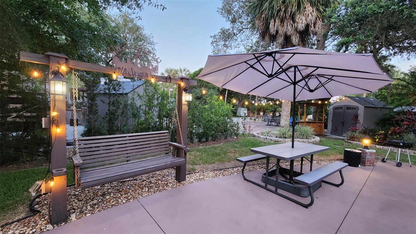 Looking for a LUXURY RV Lot to BUY in FLORIDA?  Look no further!  Full Privacy at this River Ranch Lot in Central Florida! 
Escape to your own slice of paradise at the premier River Ranch RV Resort! This beautifully landscaped, premium luxury RV lot (Lot 187) is meticulously designed for relaxing weekends, effortlessly entertaining friends, and fully embracing the ultimate Florida resort lifestyle. The spacious, move-in-ready concrete pad features mature shade trees for enhanced privacy, expansive paved outdoor entertaining spaces, and ambient café lighting that creates the perfect evening glow.  Ownership of this fee-simple parcel lets you live the lifestyle you have earned without the hassle. The comprehensive HOA fee of $942 every quarter delivers effortless, turn-key convenience by covering water, high-speed internet, TV/streaming service, routine lawn maintenance, trash service, and 24/7 guarded security, leaving you with nothing left to do but bring your RV.
As a deeded lot owner, you gain exclusive access to premium, private amenities including a resort-style pool and hot tub, active pickleball courts, a fitness center, and a dedicated Owner’s Lounge equipped with billiards, poker tables, and social lounge areas. Best of all, this golf-cart-friendly community places you right next door to the legendary Westgate River Ranch Resort attractions. You can easily cruise over to enjoy the world-famous Saturday night rodeo, visit the saloon and restaurants, or take advantage of the adventure park, waterpark, airboat rides, horseback riding, mini-golf, and trap and skeet shooting. Whether you are searching for a personal weekend retreat, full-time luxury resort living, or a high-performing cash-flow investment opportunity, Lot 187 offers an unmatched combination of recreation and relaxation.